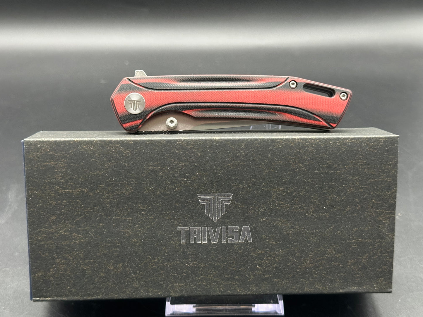 TRIVISA VOLANS-03RB FOLDING KNIFE RED/BLACK G10 HANDLE 154CM PLAIN EDGE STONEWASH/SATIN FINISH