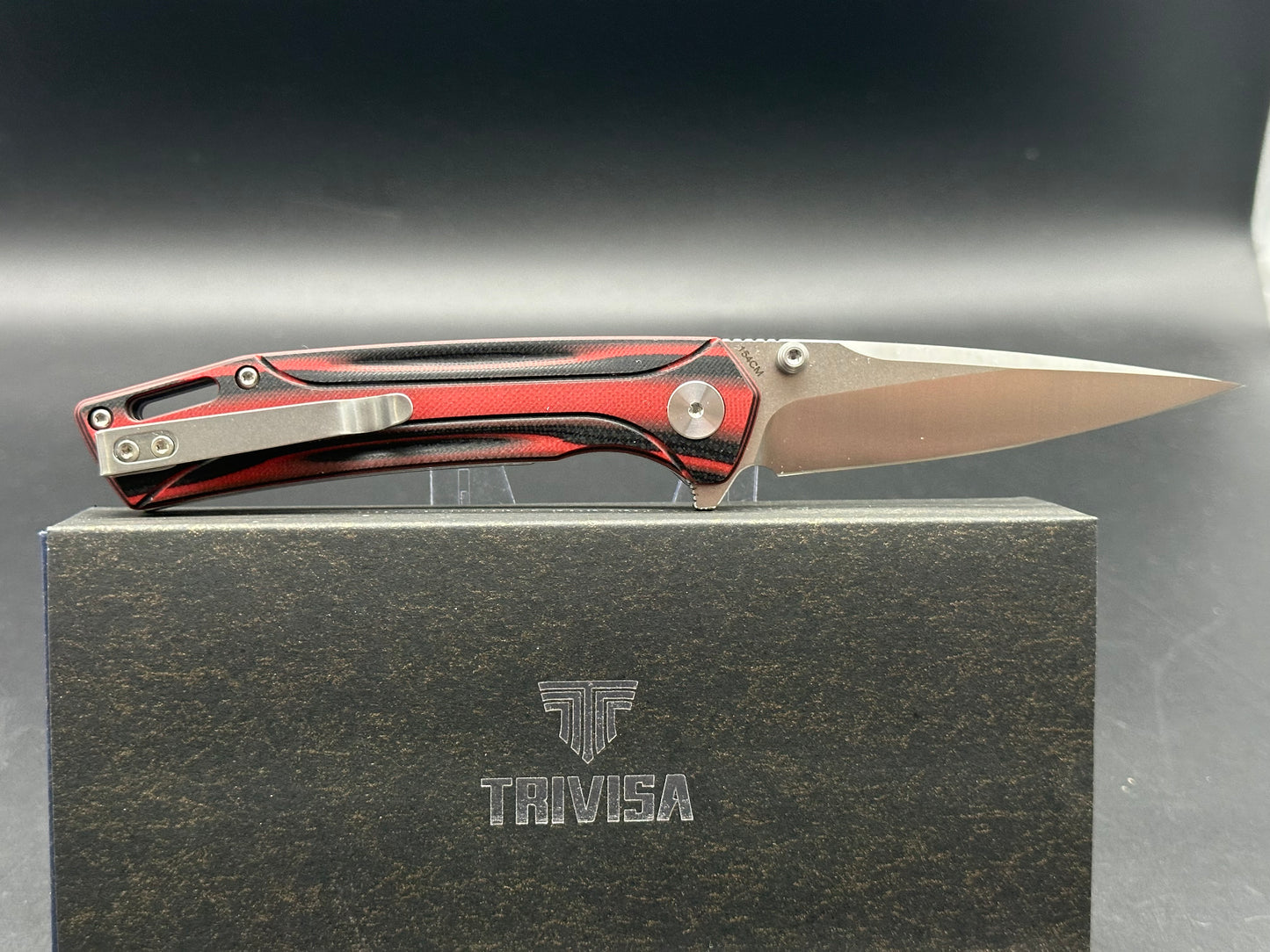 TRIVISA VOLANS-03RB FOLDING KNIFE RED/BLACK G10 HANDLE 154CM PLAIN EDGE STONEWASH/SATIN FINISH