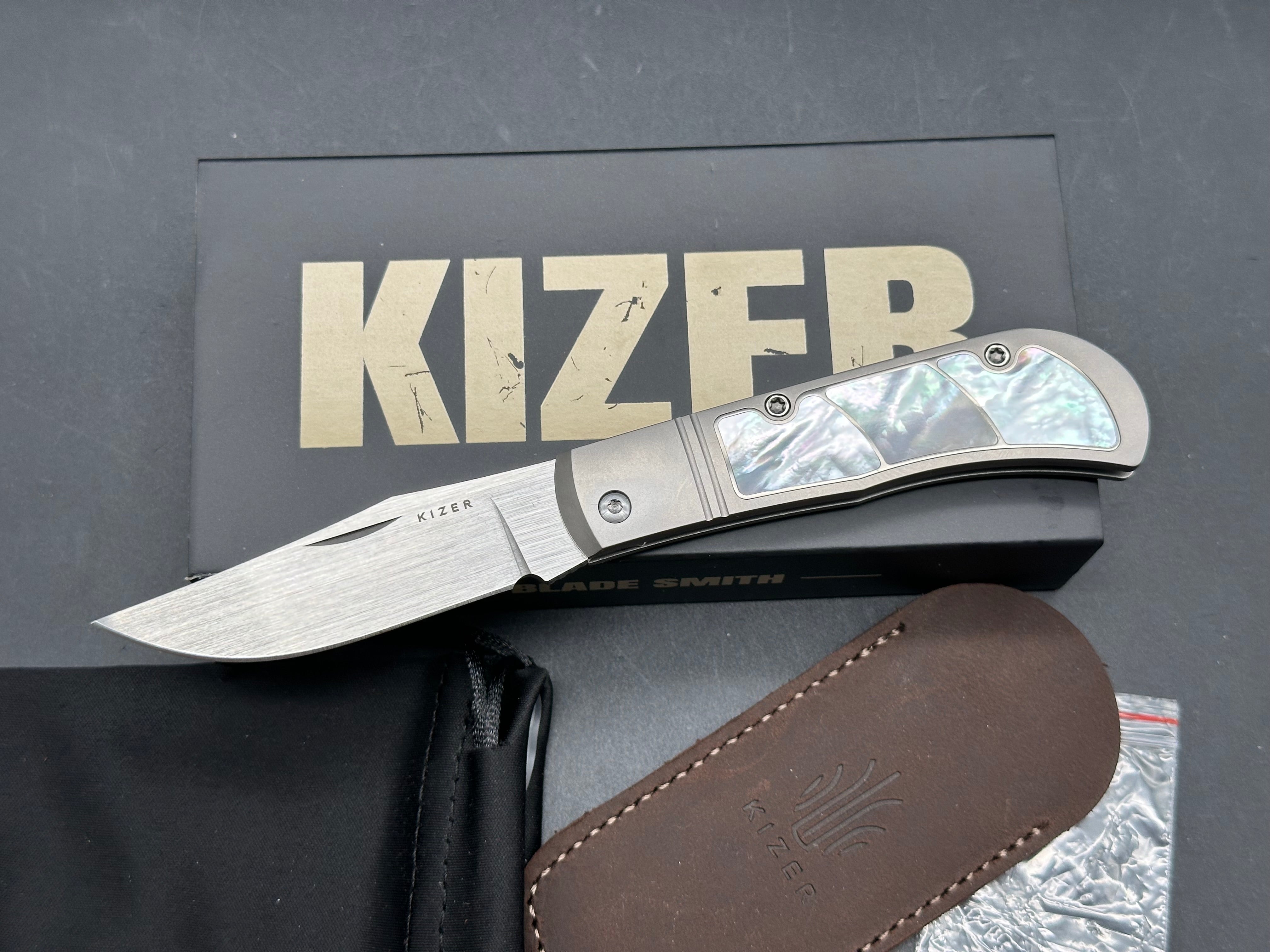 KIZER TRESTLE PEARL TITANIUM HANDLE S45VN CLIP POINT PLAIN EDGE