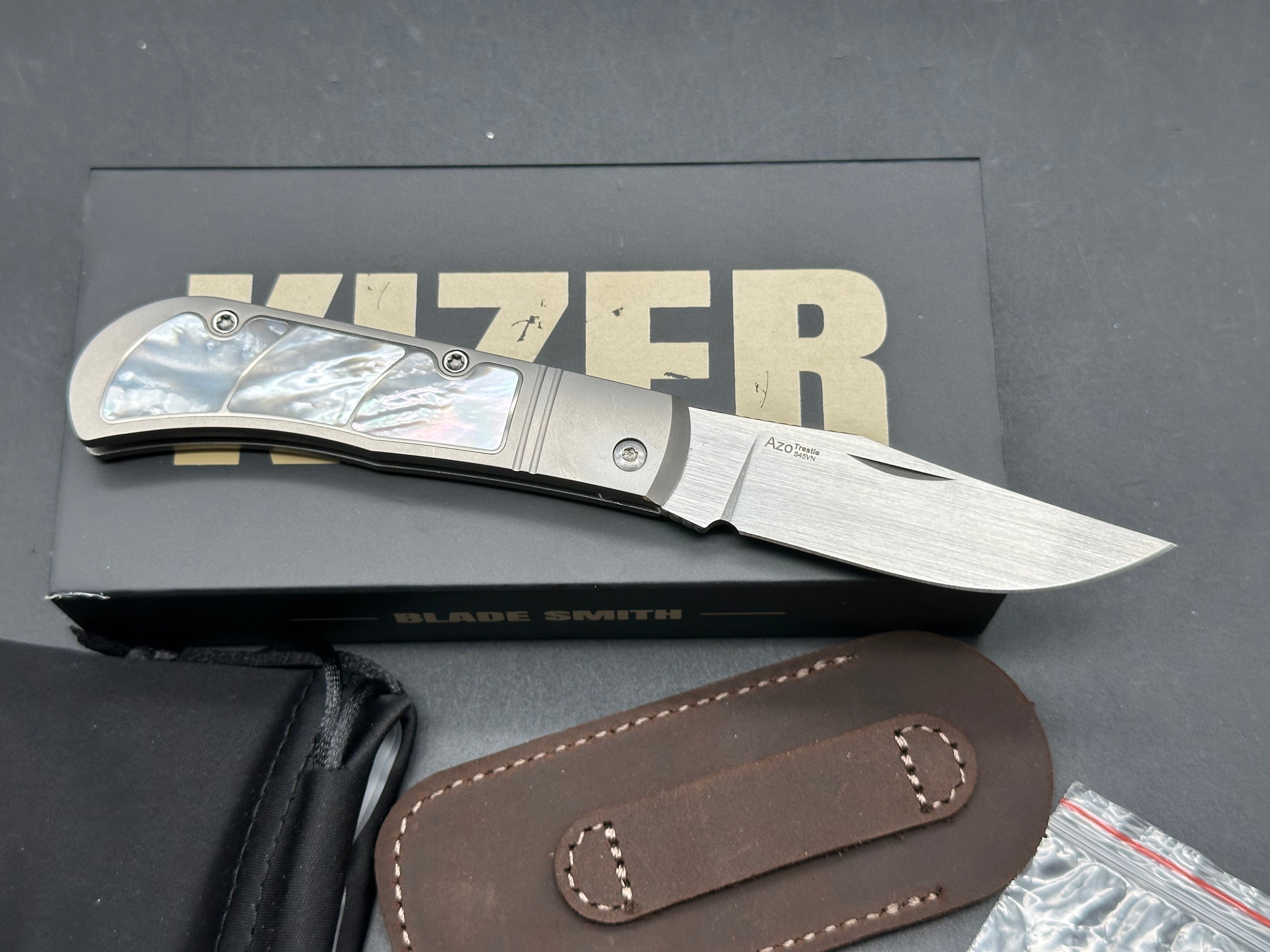 KIZER TRESTLE PEARL TITANIUM HANDLE S45VN CLIP POINT PLAIN EDGE