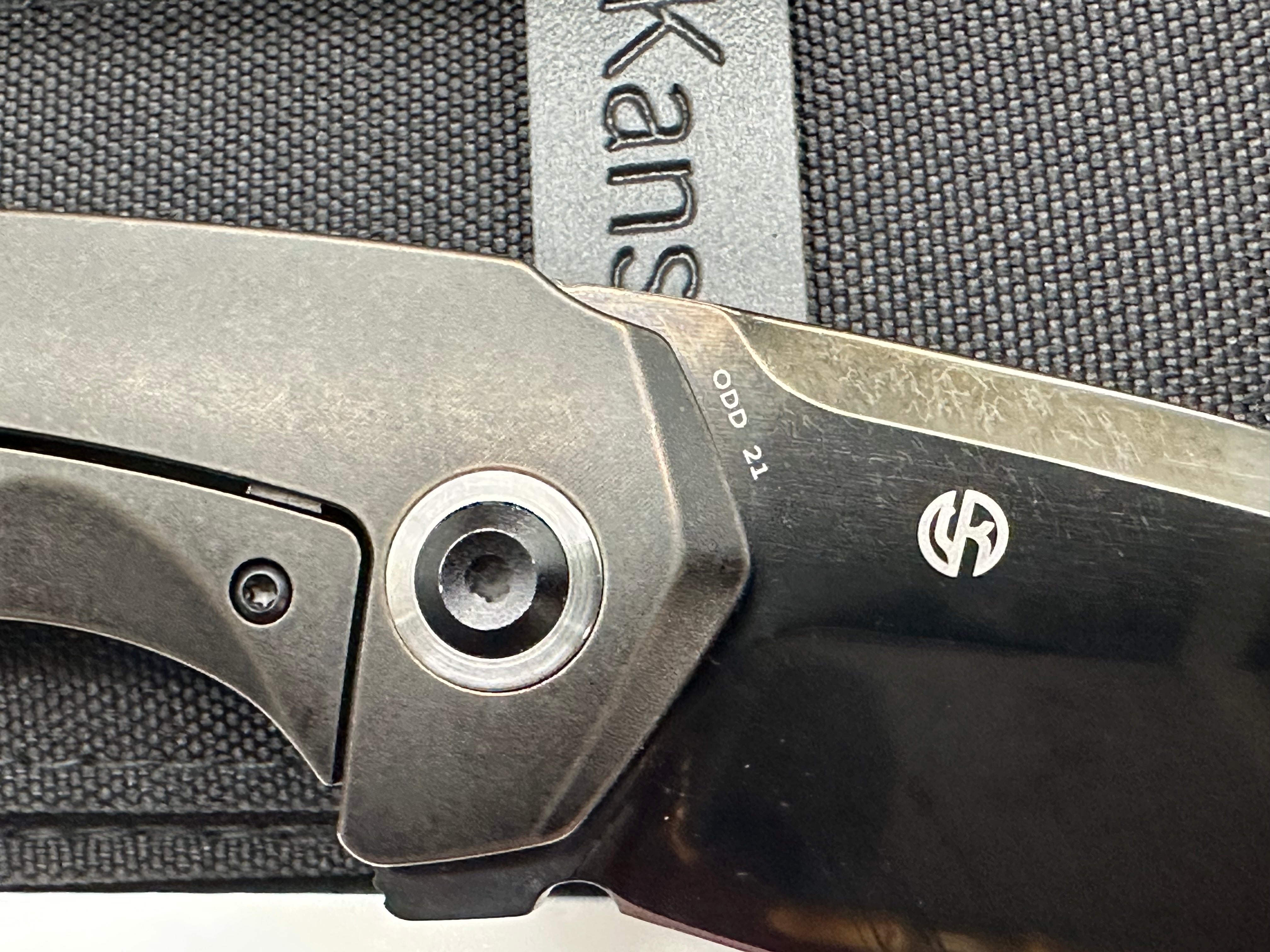 ODD 21 FRAME LOCK BLACKWASH TITANIUM W/ BRONZE HOLES HANDLE (3.08'' MIRROR DLC CPM20CV