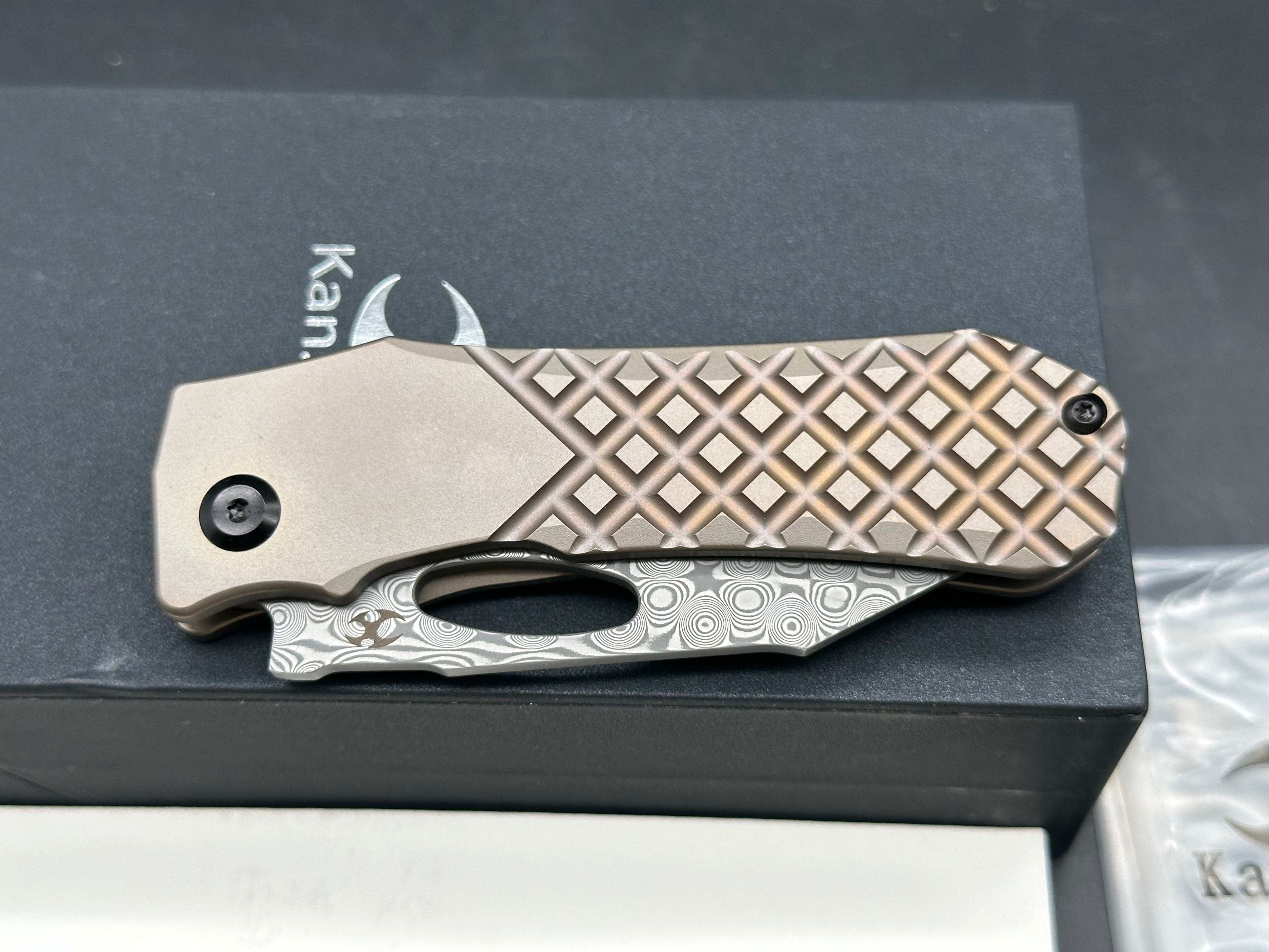 Kansept Knives Loki Frame Lock Folding Knife 2.99" Damascus Black Harpoon Blade, Bronze Frag Titanium Handles