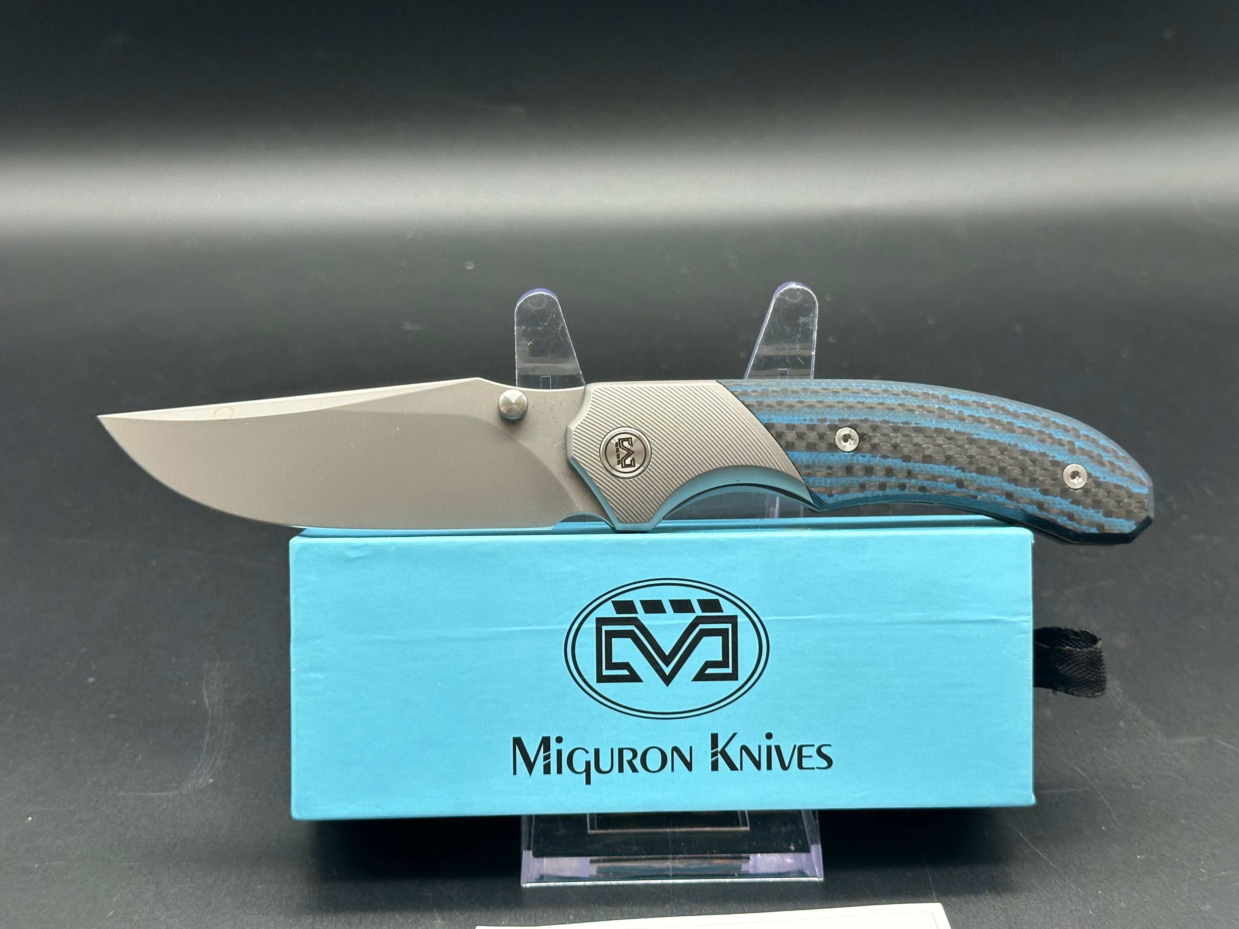 MIGURON CENTURION FOLDING KNIFE TITANIUM/BLUE CARBON FIBER HANDLE M390 PLAIN EDGE SANDBLAST FINISH