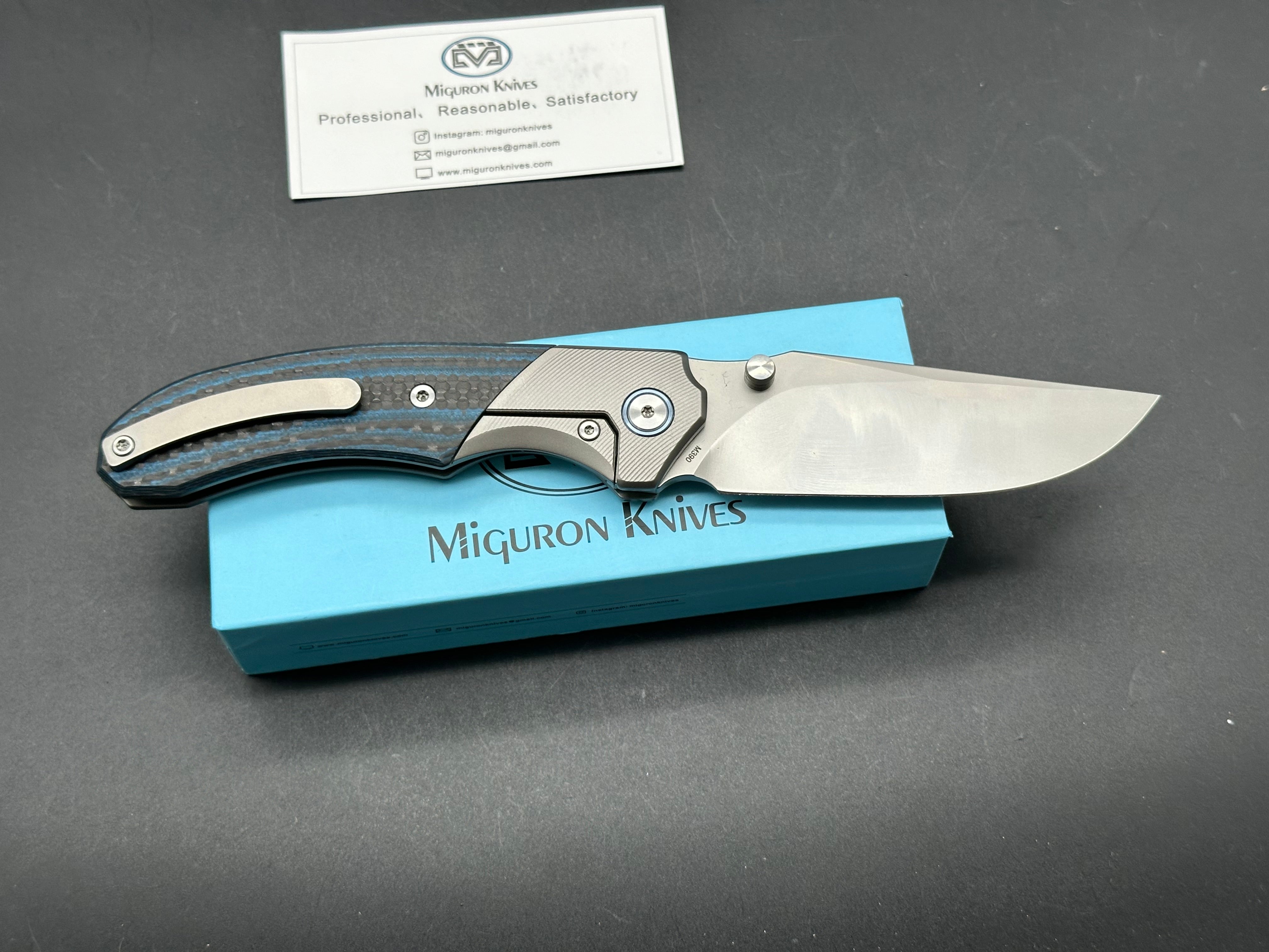 MIGURON CENTURION FOLDING KNIFE TITANIUM/BLUE CARBON FIBER HANDLE M390 PLAIN EDGE SANDBLAST FINISH