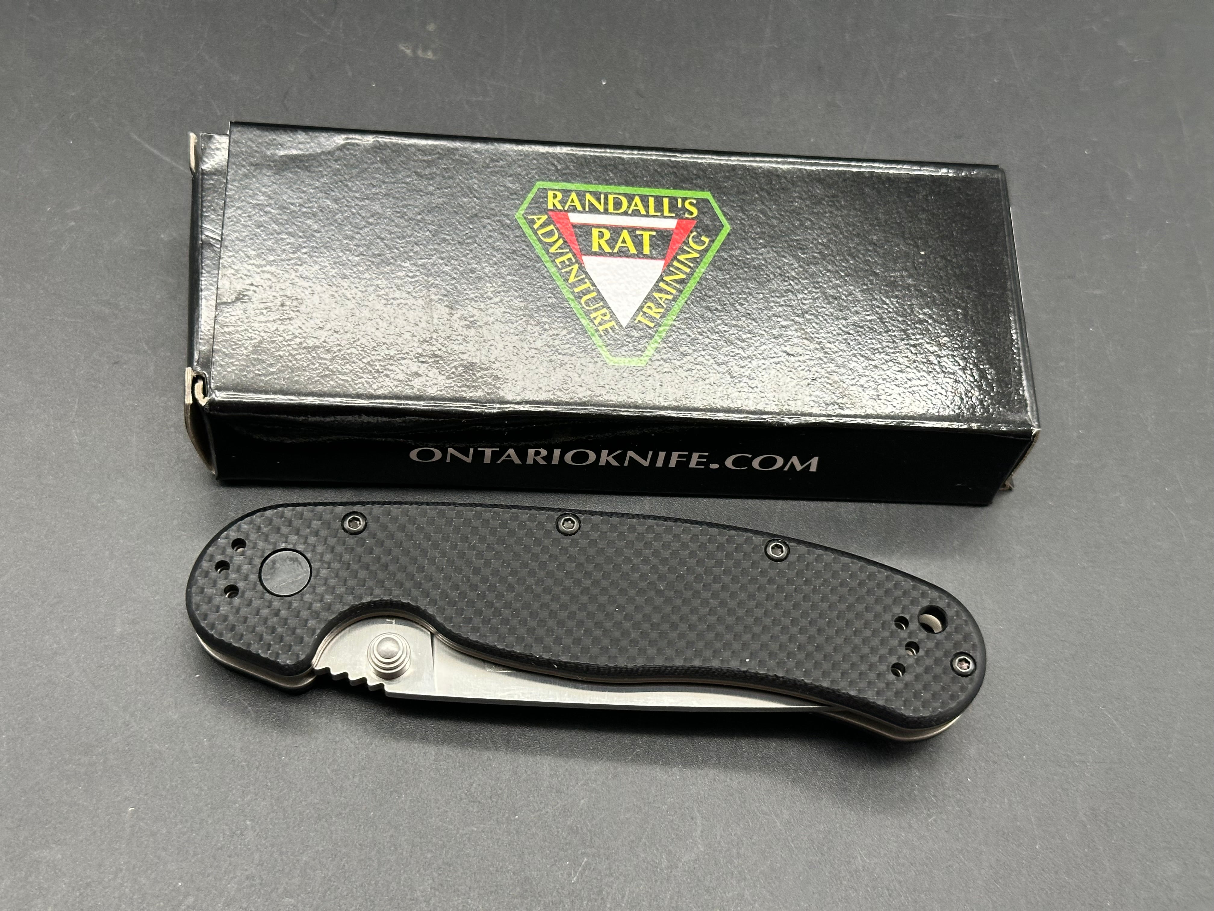 Ontario Rat Model 1.5 3.25" CPM MagnaCut with Black Textured G10 Scales