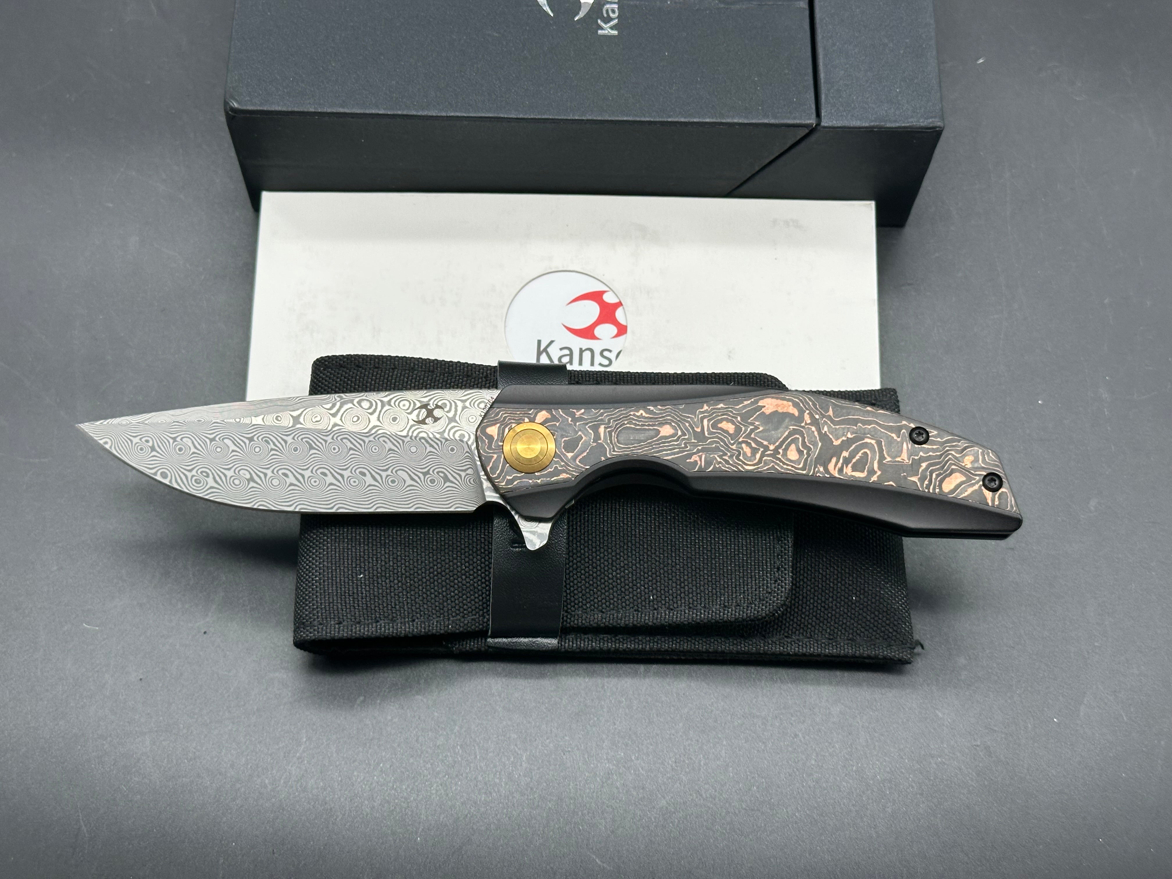 KANSEPT ACCIPITER TITANIUM/COPPER CF HANDLE DAMASCUS BLADE