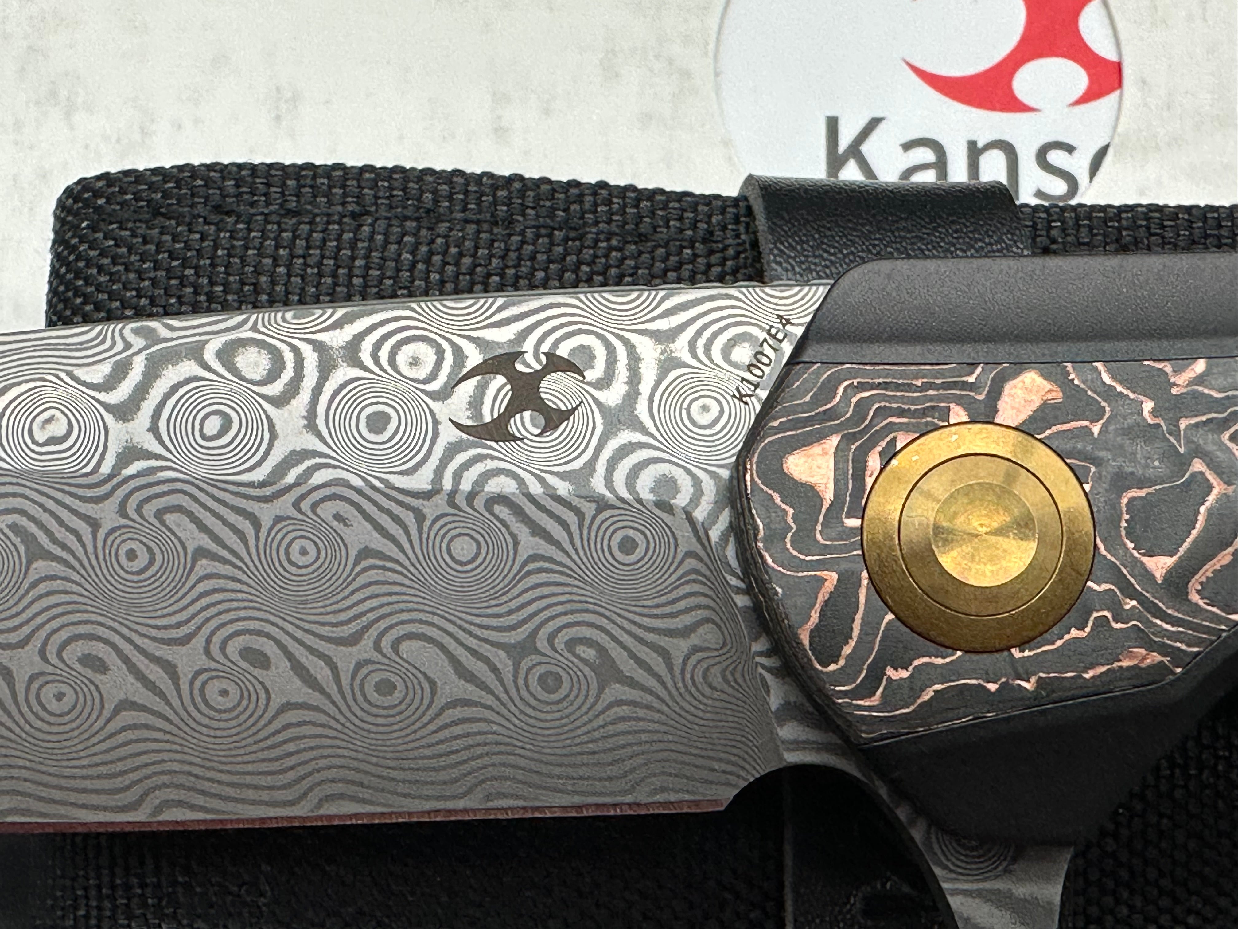 KANSEPT ACCIPITER TITANIUM/COPPER CF HANDLE DAMASCUS BLADE