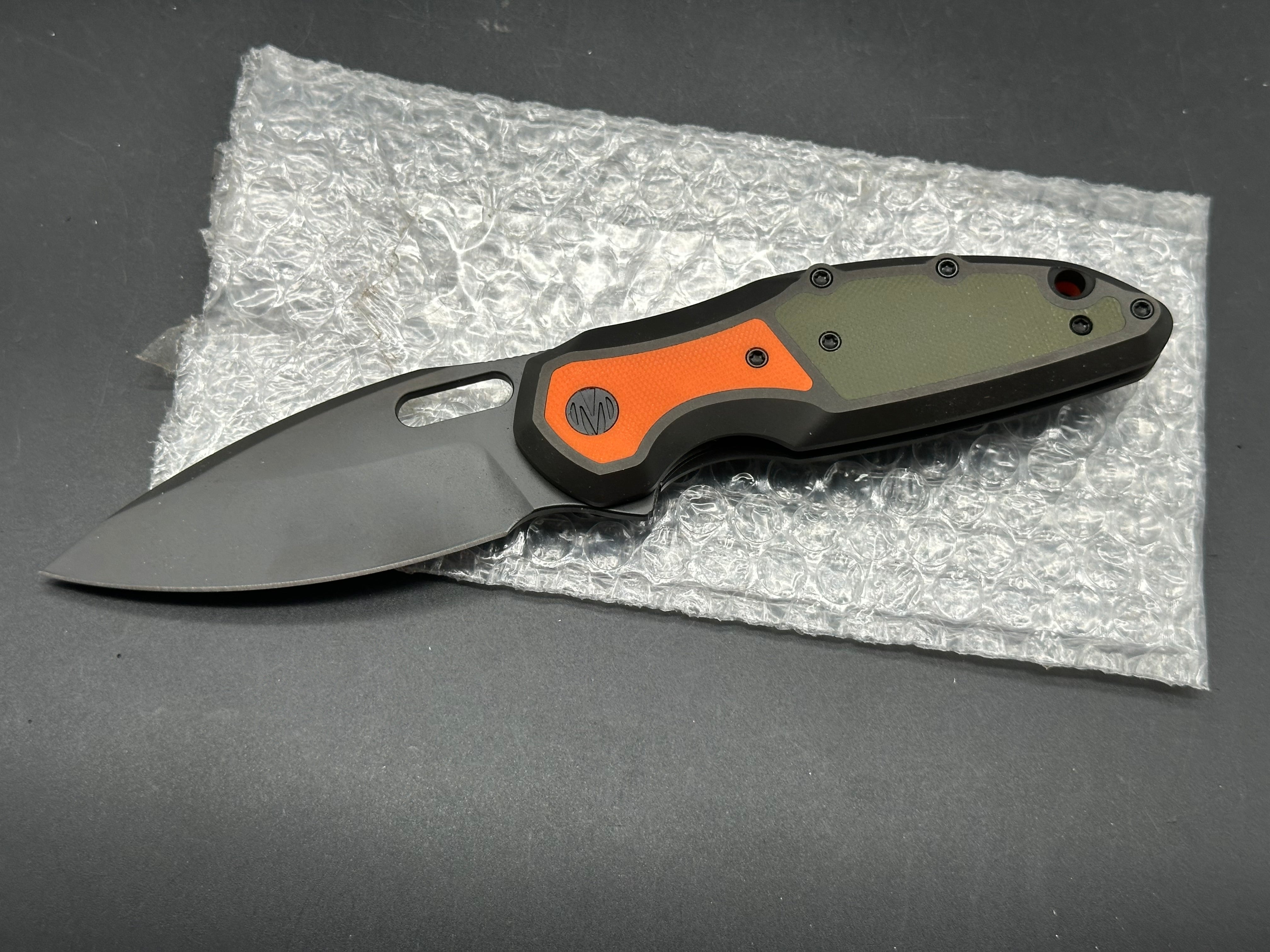 Molsect Mantle Prototype titanium/G10 handle w/S35VN blade