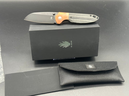 Kizer Deviant copper/micarta M390