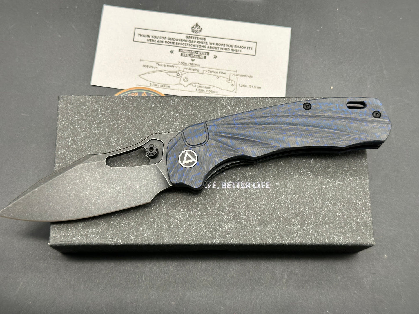 QSP HORNBILL FOLDING KNIFE BLUE CARBON FIBER HANDLE S35VN PLAIN EDGE BLACK STONEWASH FINISH QS146-B2