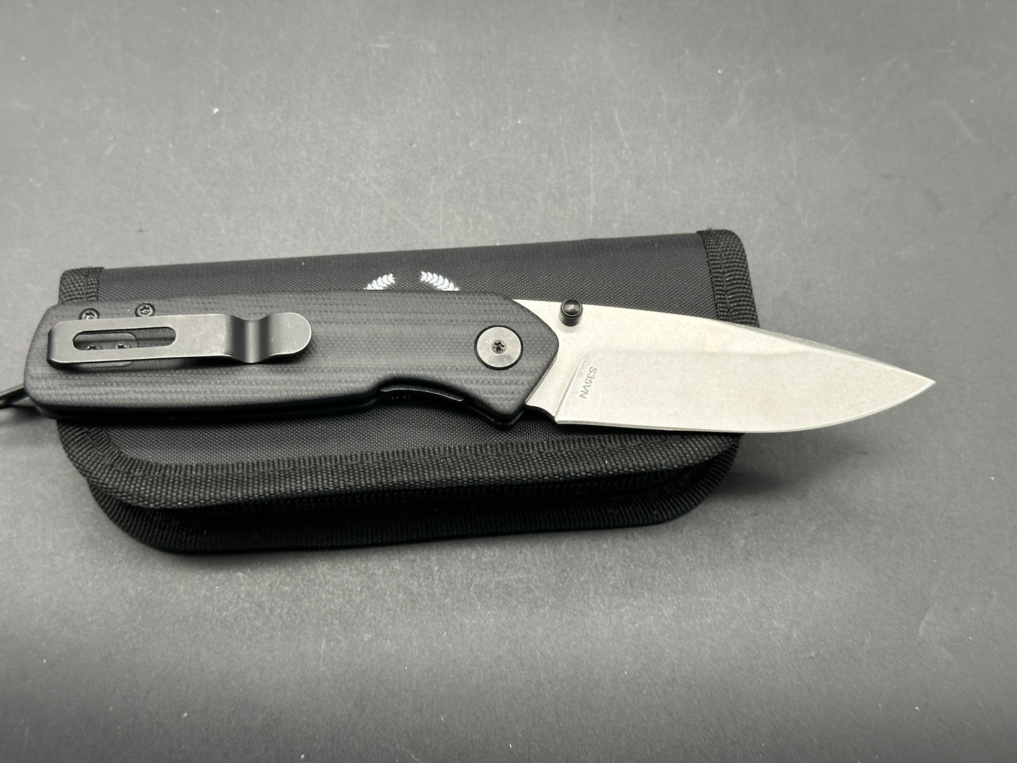 Asher Spiro TS (Thumb Studs), 3.2" S35VN Stonewash Blade with Black G10 Handle.