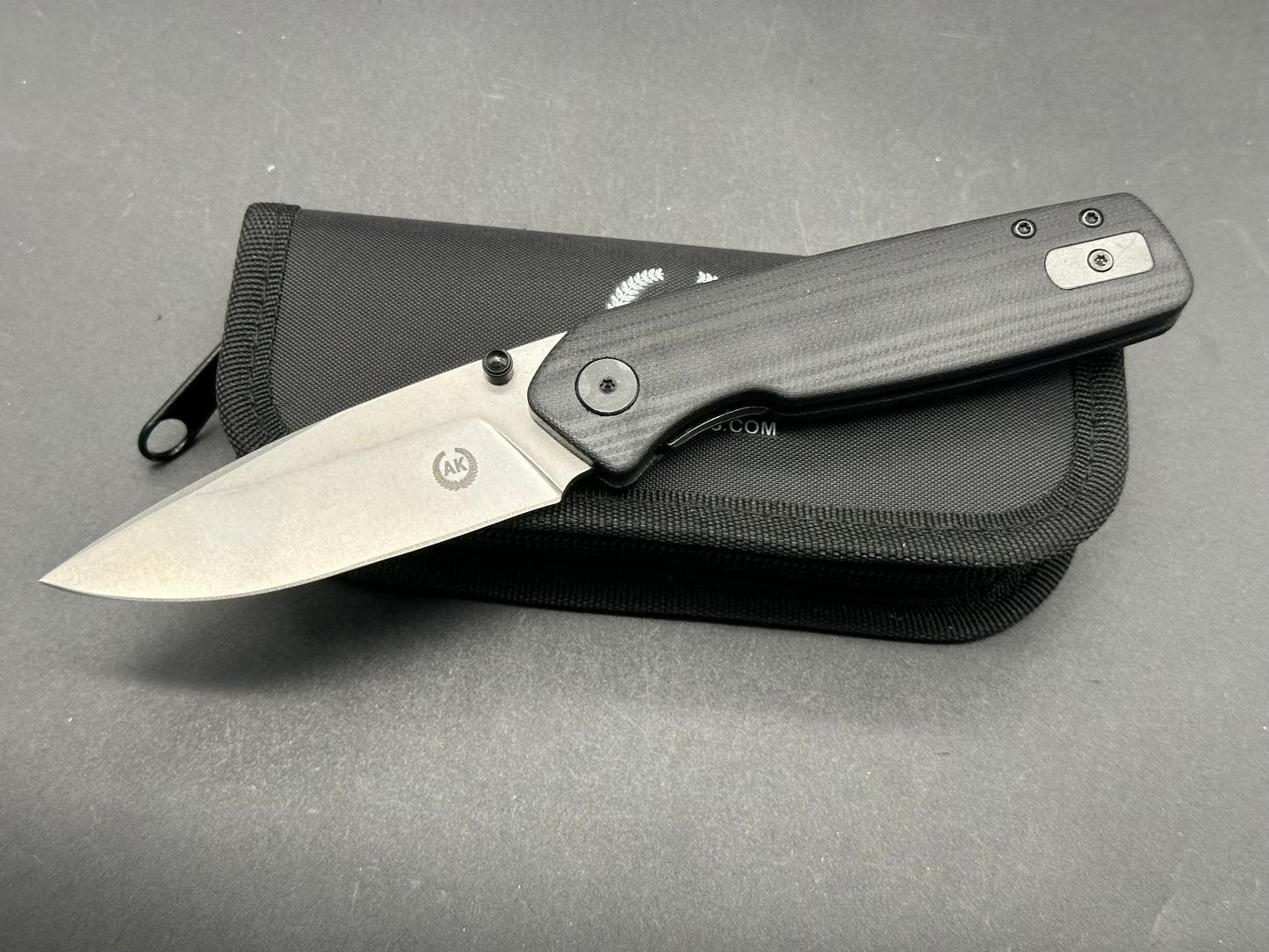 Asher Spiro TS (Thumb Studs), 3.2" S35VN Stonewash Blade with Black G10 Handle.