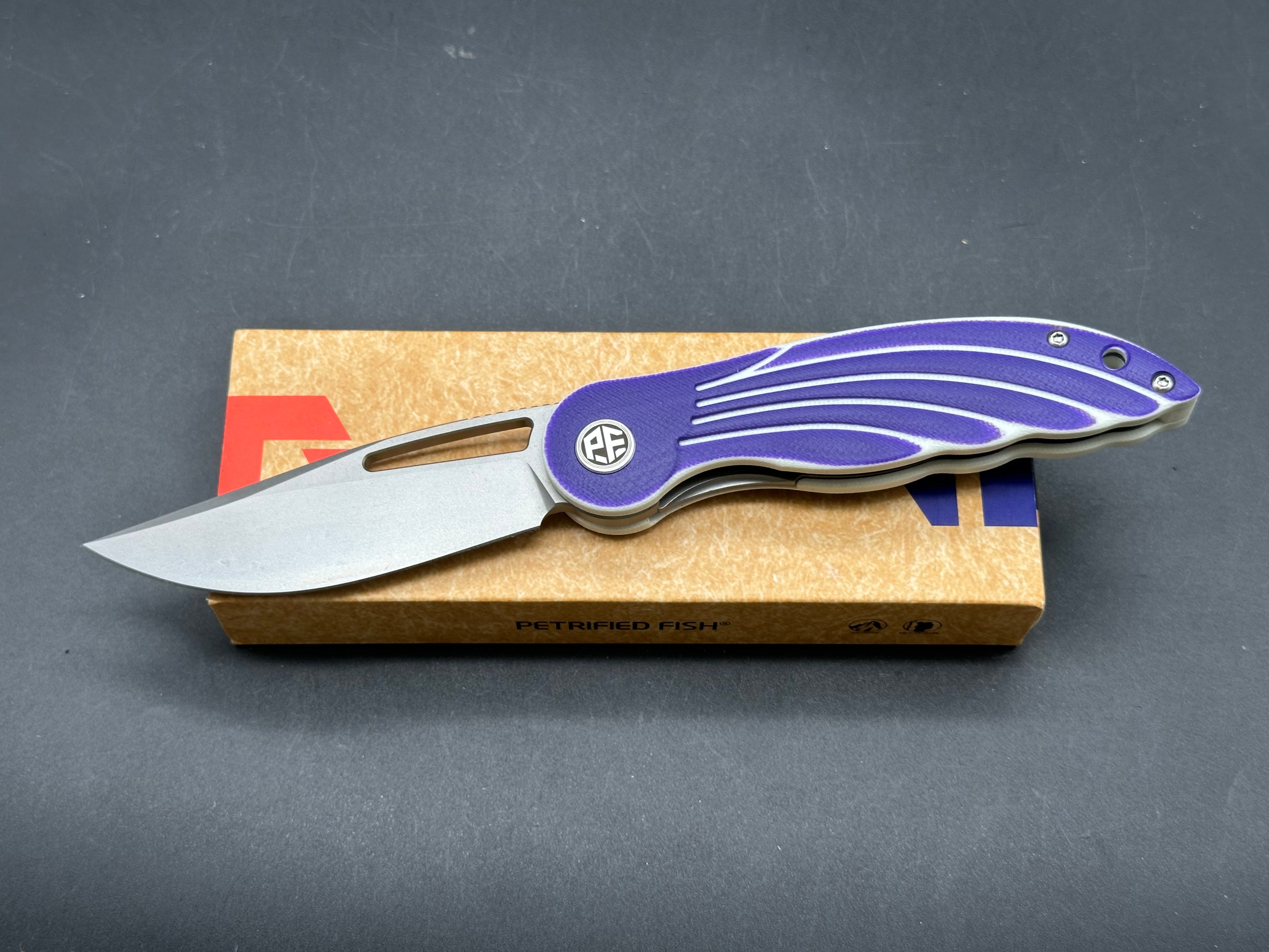 Petrified Fish PFE06 Nightingale 14C28N Blade Purple/White G10 Handle Folding knife