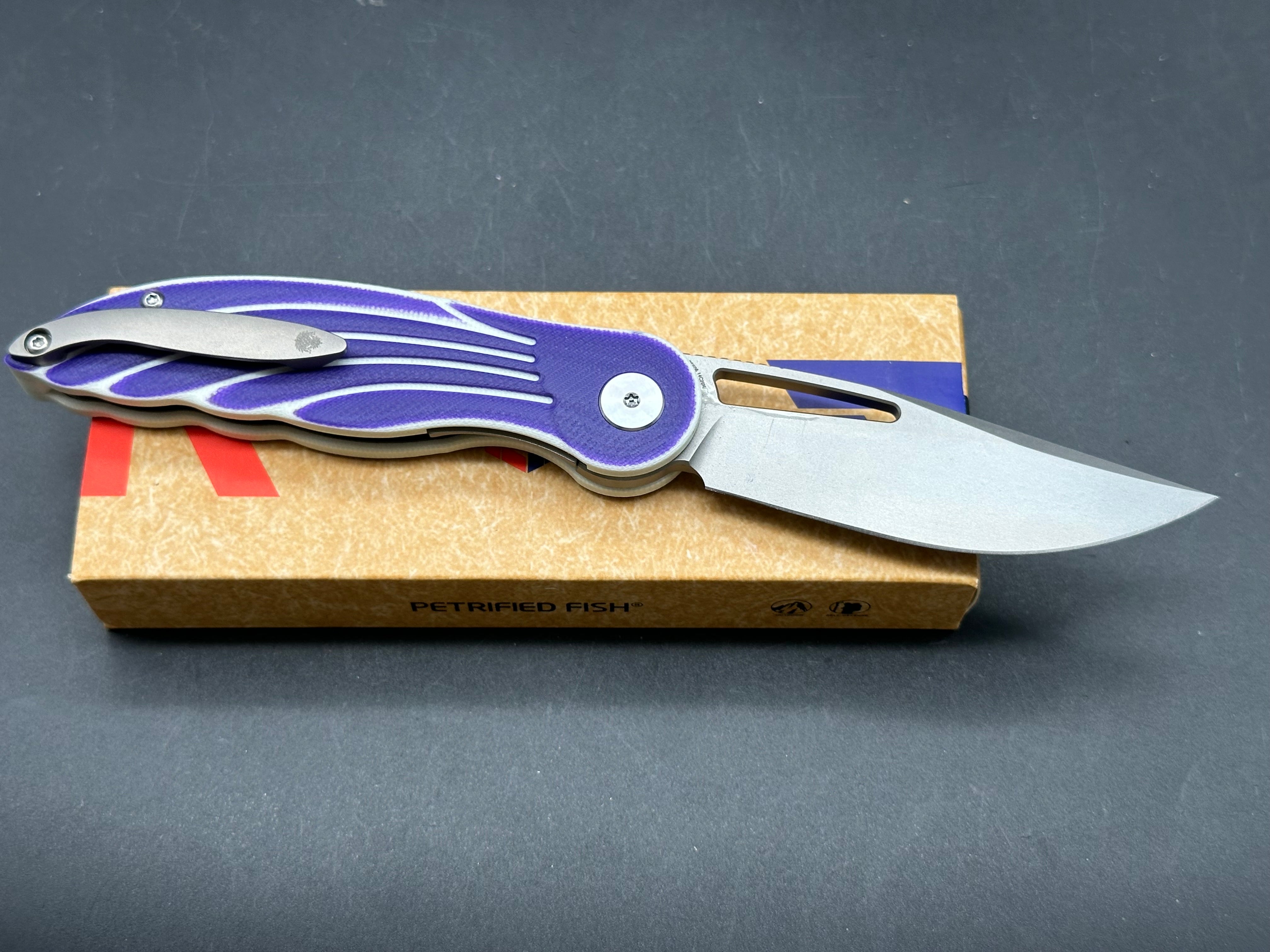 Petrified Fish PFE06 Nightingale 14C28N Blade Purple/White G10 Handle Folding knife