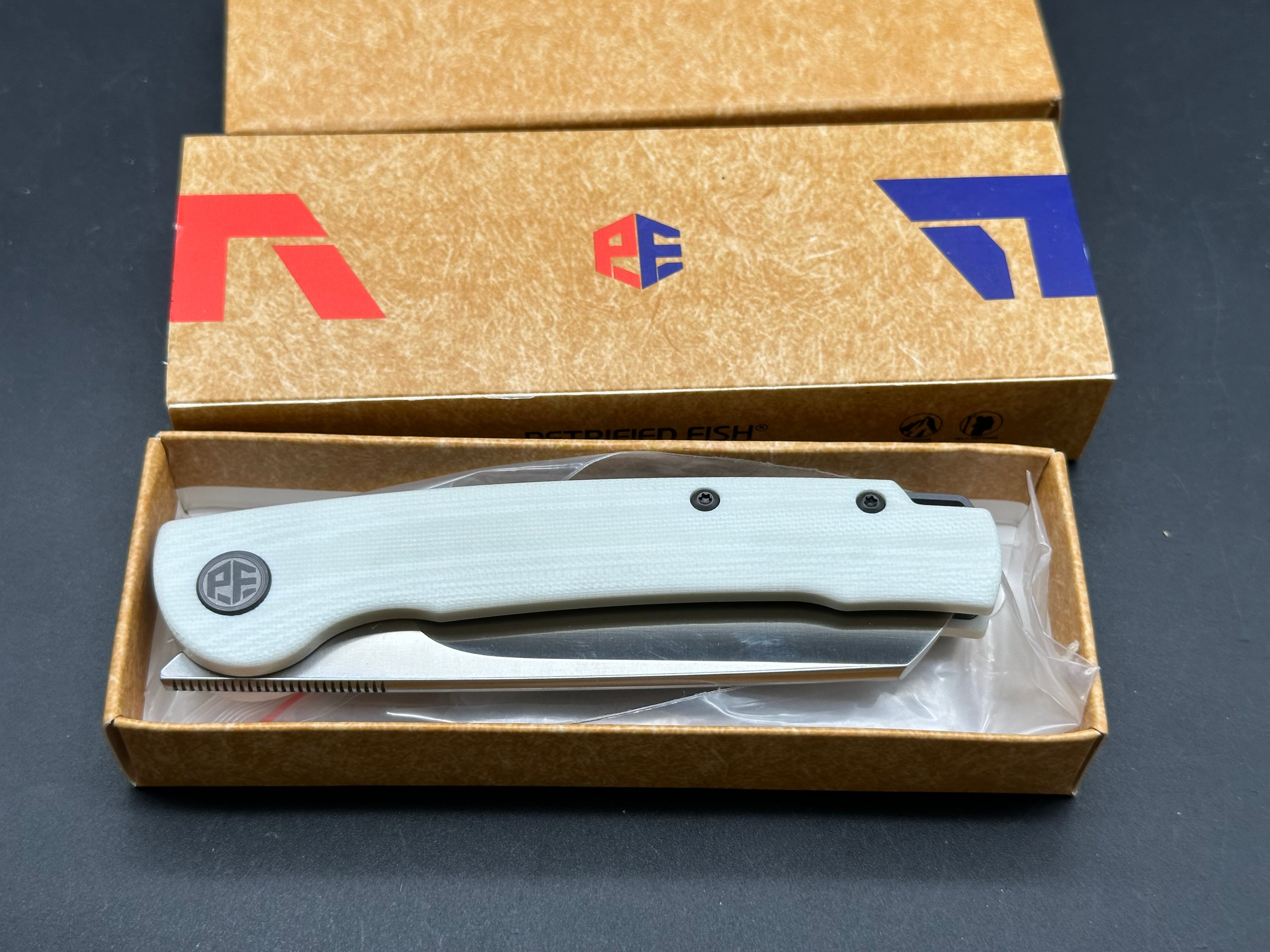 Petrified Fish PFE04 Scholar White G10  3.7" 154CM Satin Blade, Front Flipper