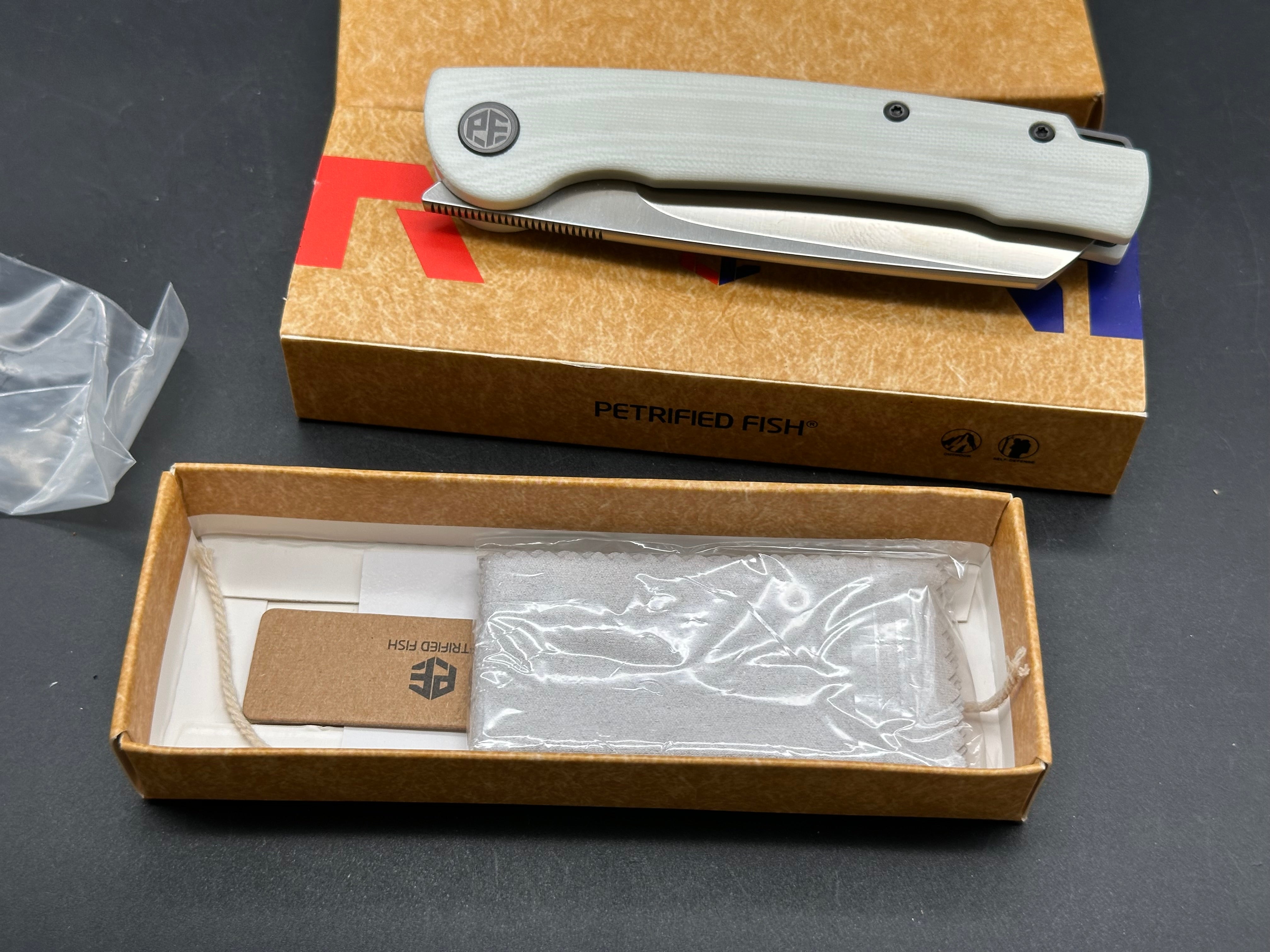 Petrified Fish PFE04 Scholar White G10  3.7" 154CM Satin Blade, Front Flipper