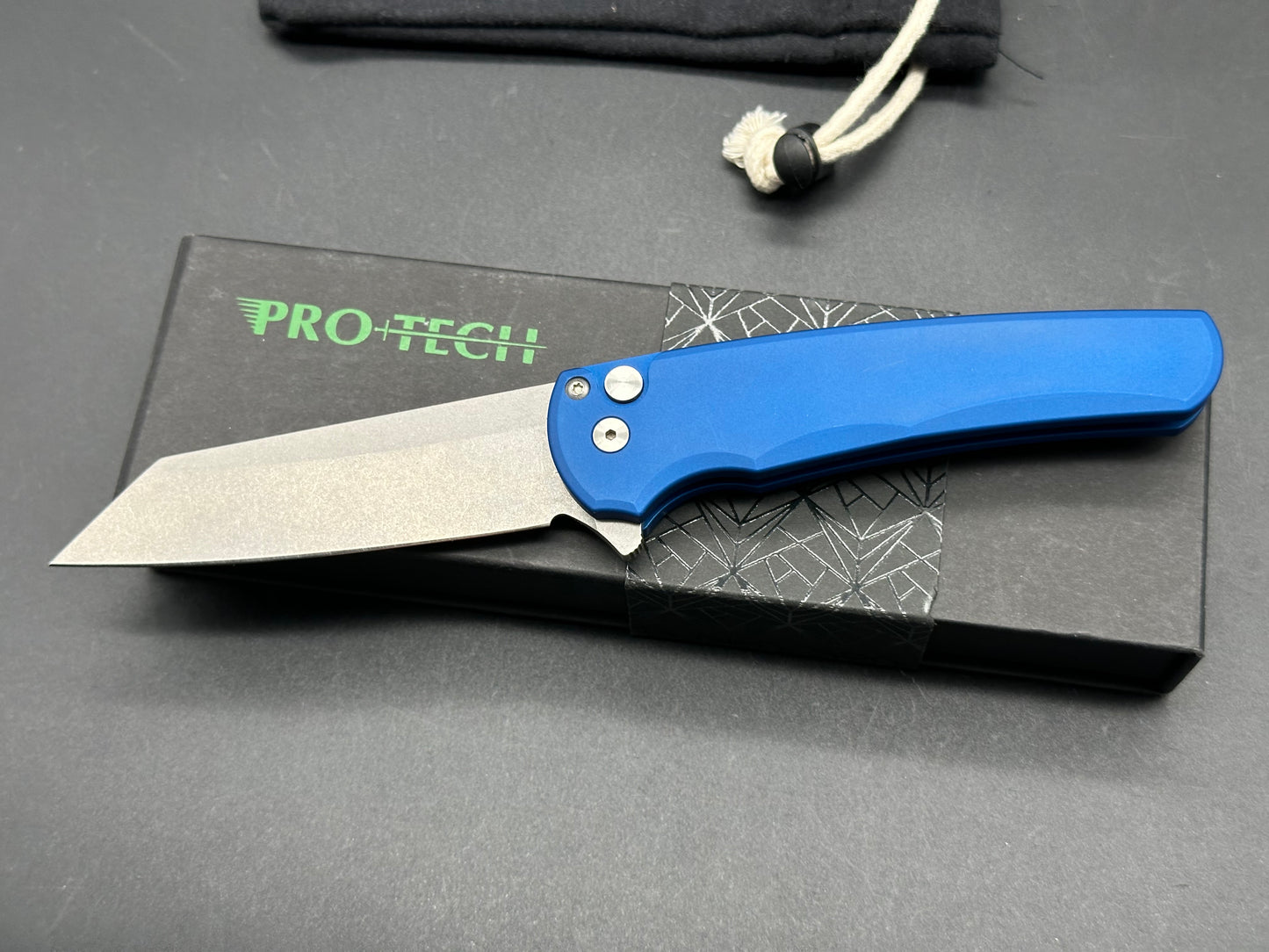 Protech Malibu - Blue handle, stonewash finish 20CV reverse tanto