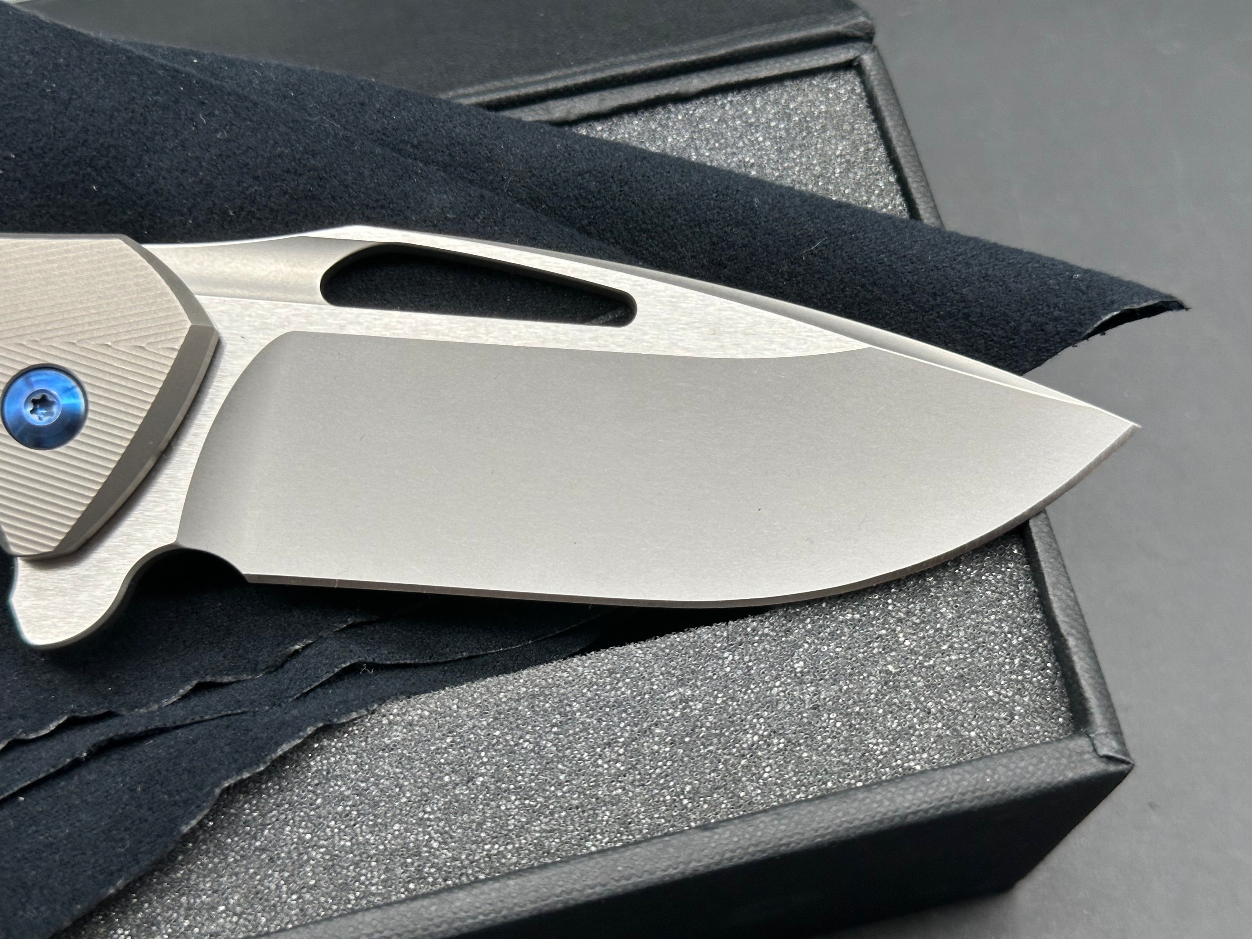 Koenig Arius with M390 Burnished Blade (3.5"), Bead Blast Patterned Ti Blue Hardware
