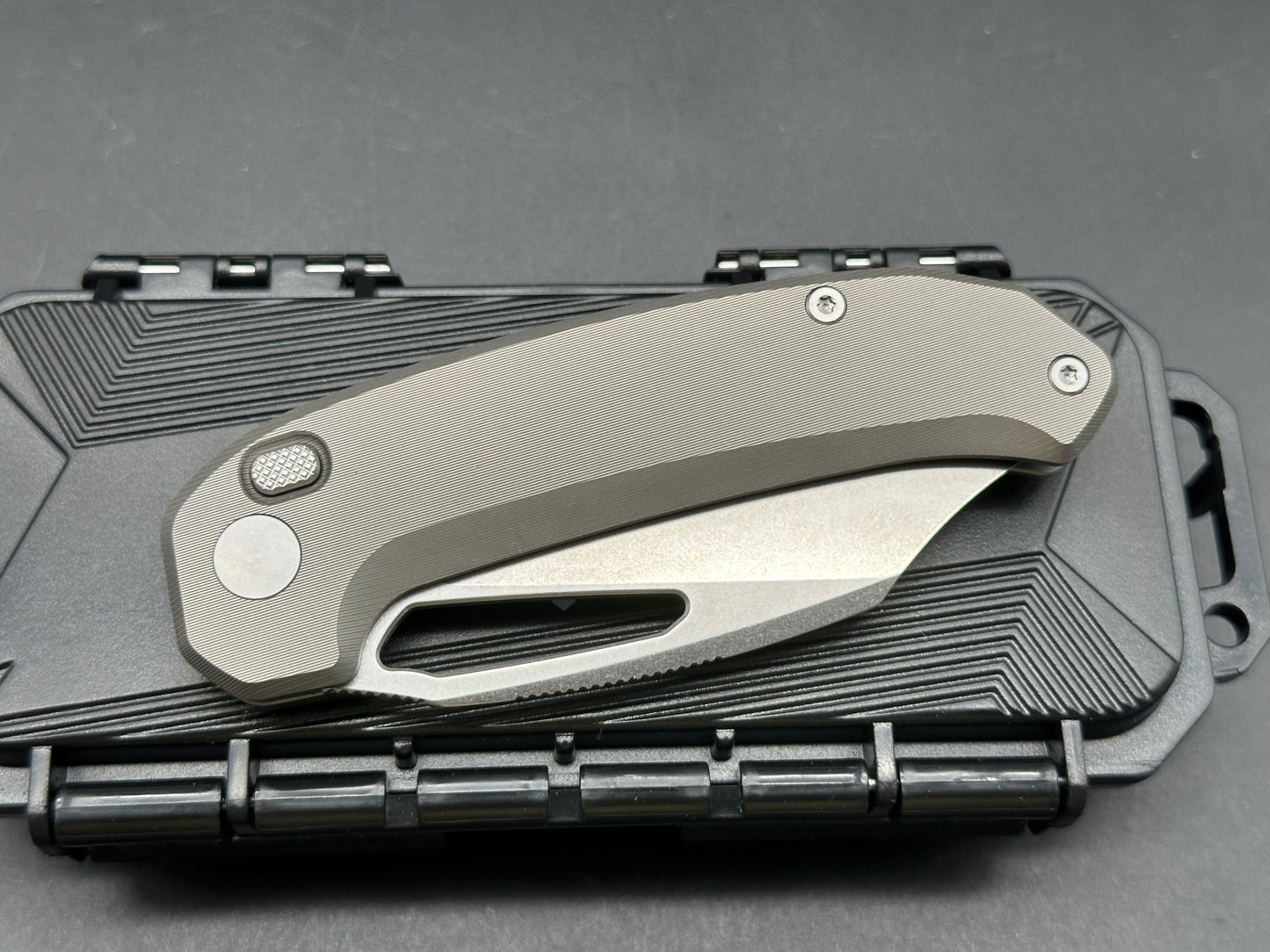 Takcom “The Unnamed “ titanium button lock Magnacut blade