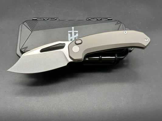 Takcom “The Unnamed “ titanium button lock Magnacut blade