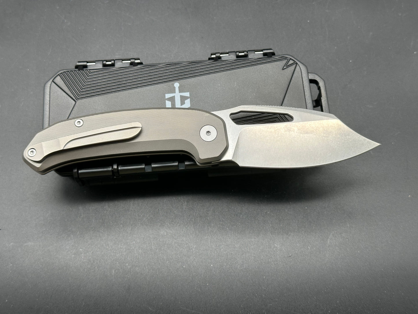 Takcom “The Unnamed “ titanium button lock Magnacut blade