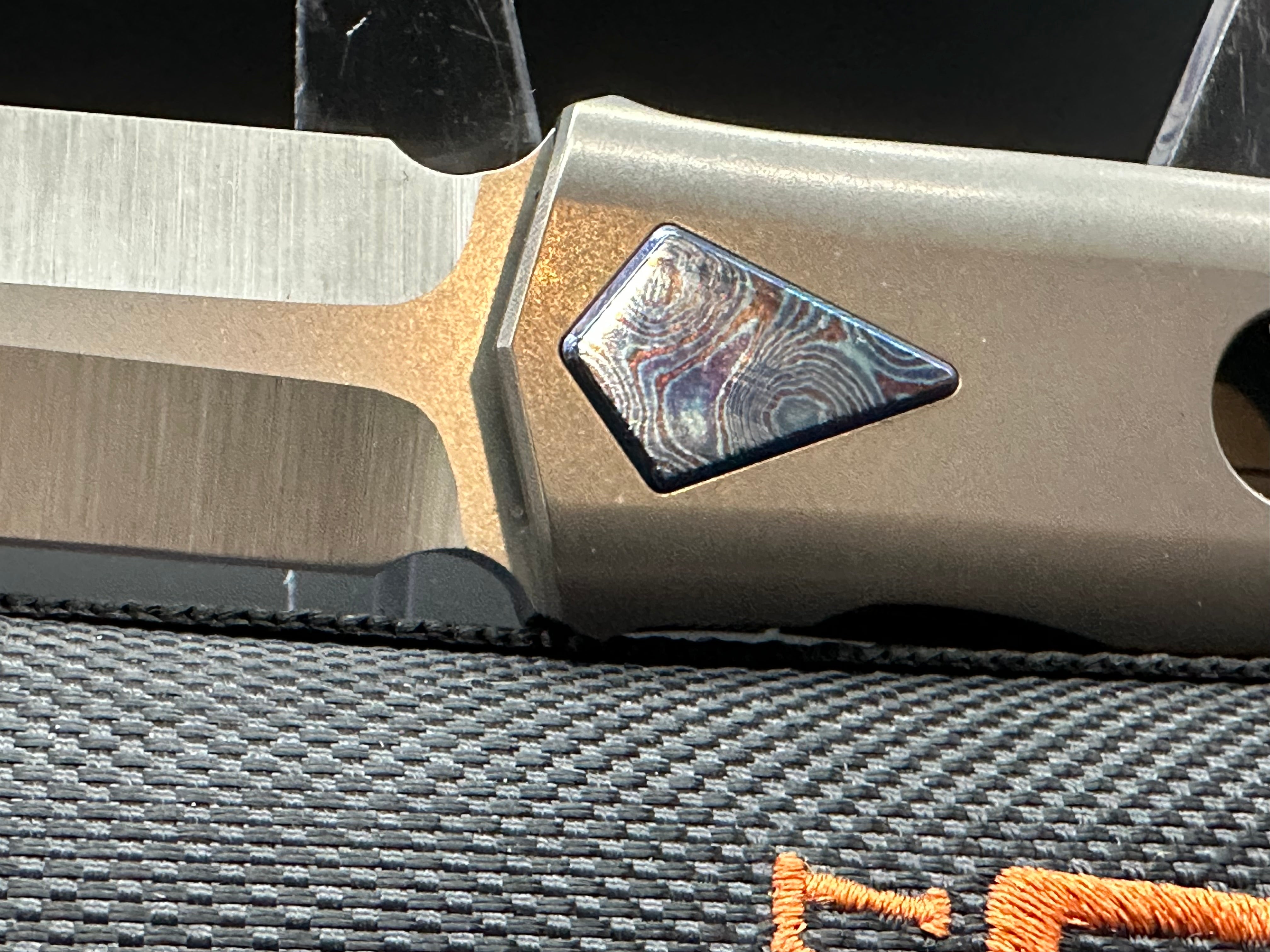 LiBing JinKe titanium front flipper w/Mokuti accents M390