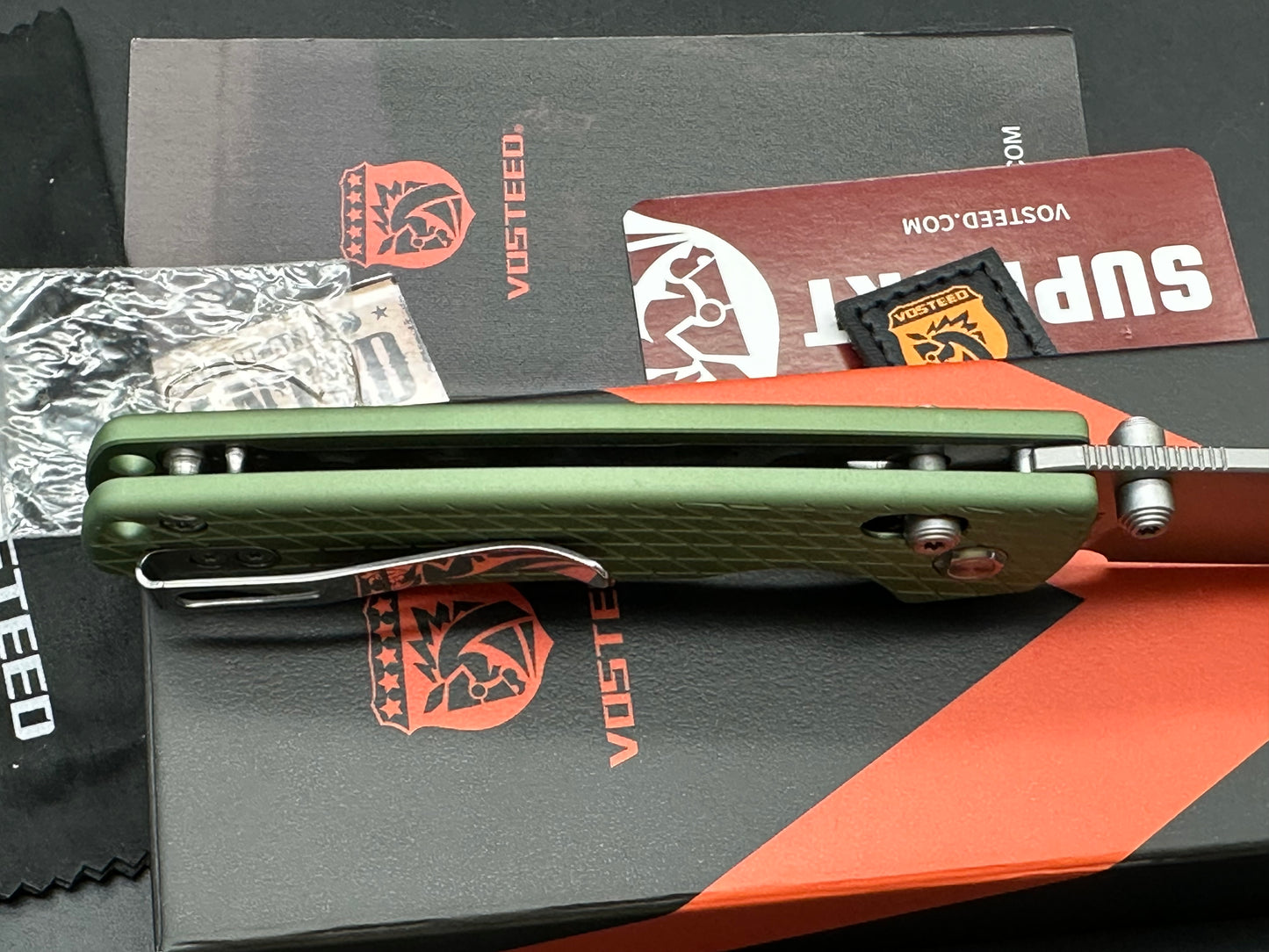 Vosteed Raccoon Cross Bar, 3.25" Nitro-V Stonewash Drop Point Blade with Green Aluminum Handle