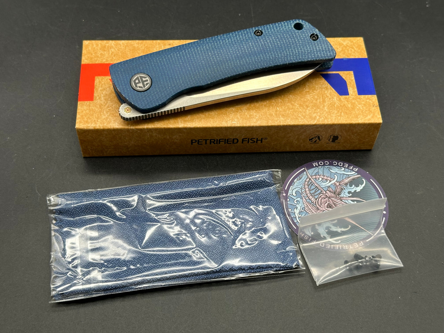 Petrified Fish PFE05 Flavorist  3.15 K110 Satin Blade Blue Micarta Handle Front Flipper