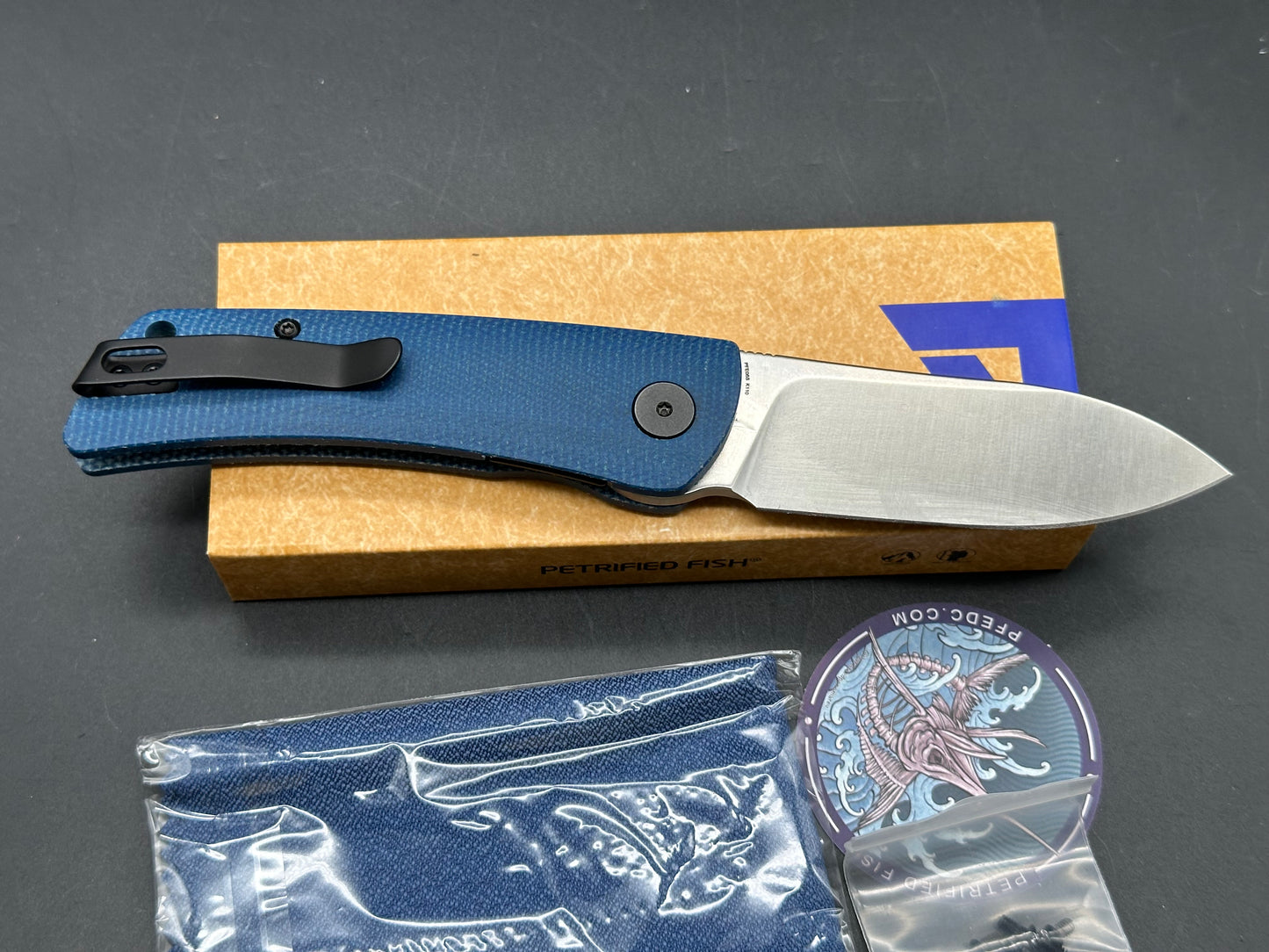 Petrified Fish PFE05 Flavorist  3.15 K110 Satin Blade Blue Micarta Handle Front Flipper