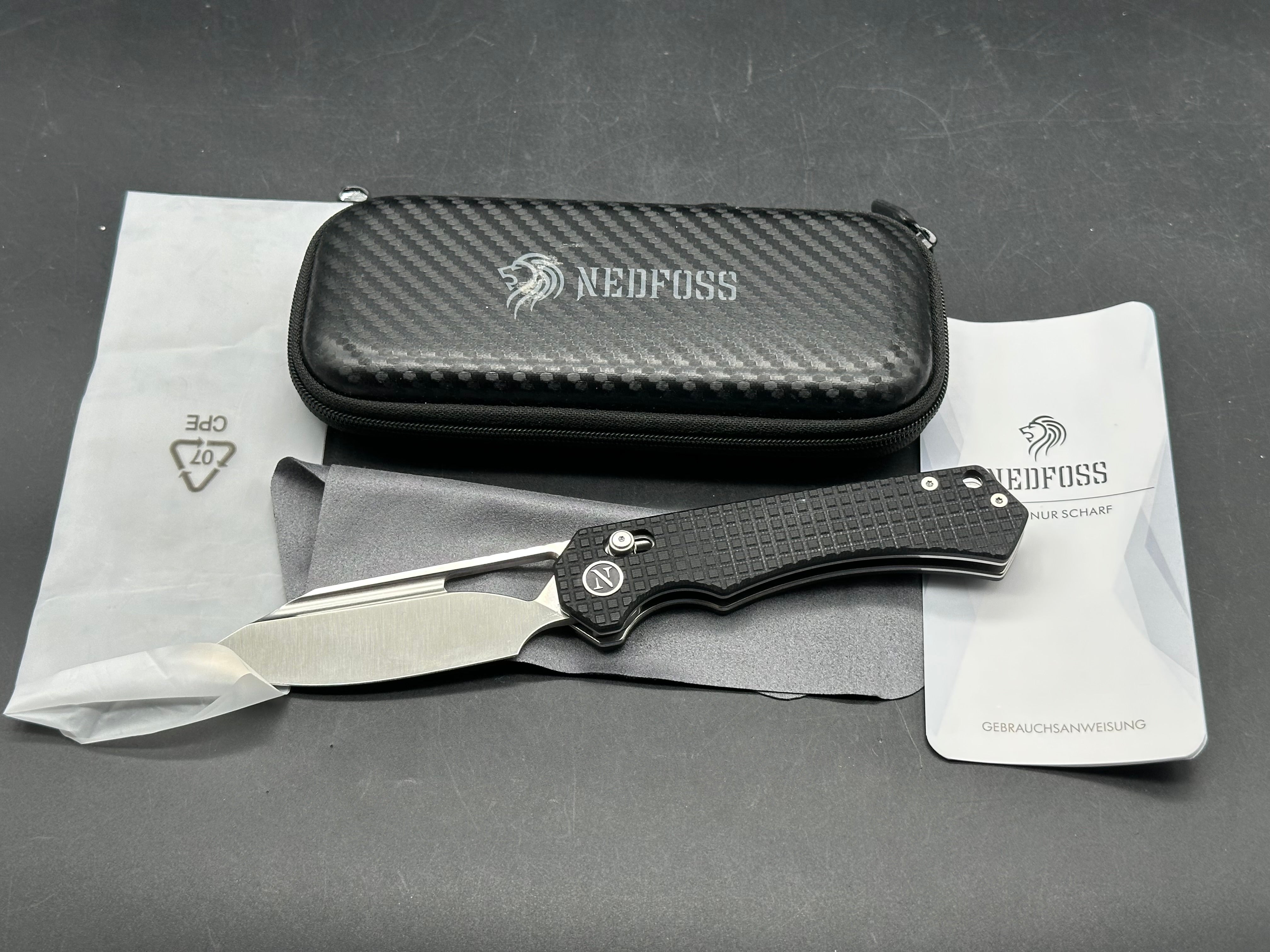 NedFoss Cougar knife black G10 scales w/14C28N clip point blade