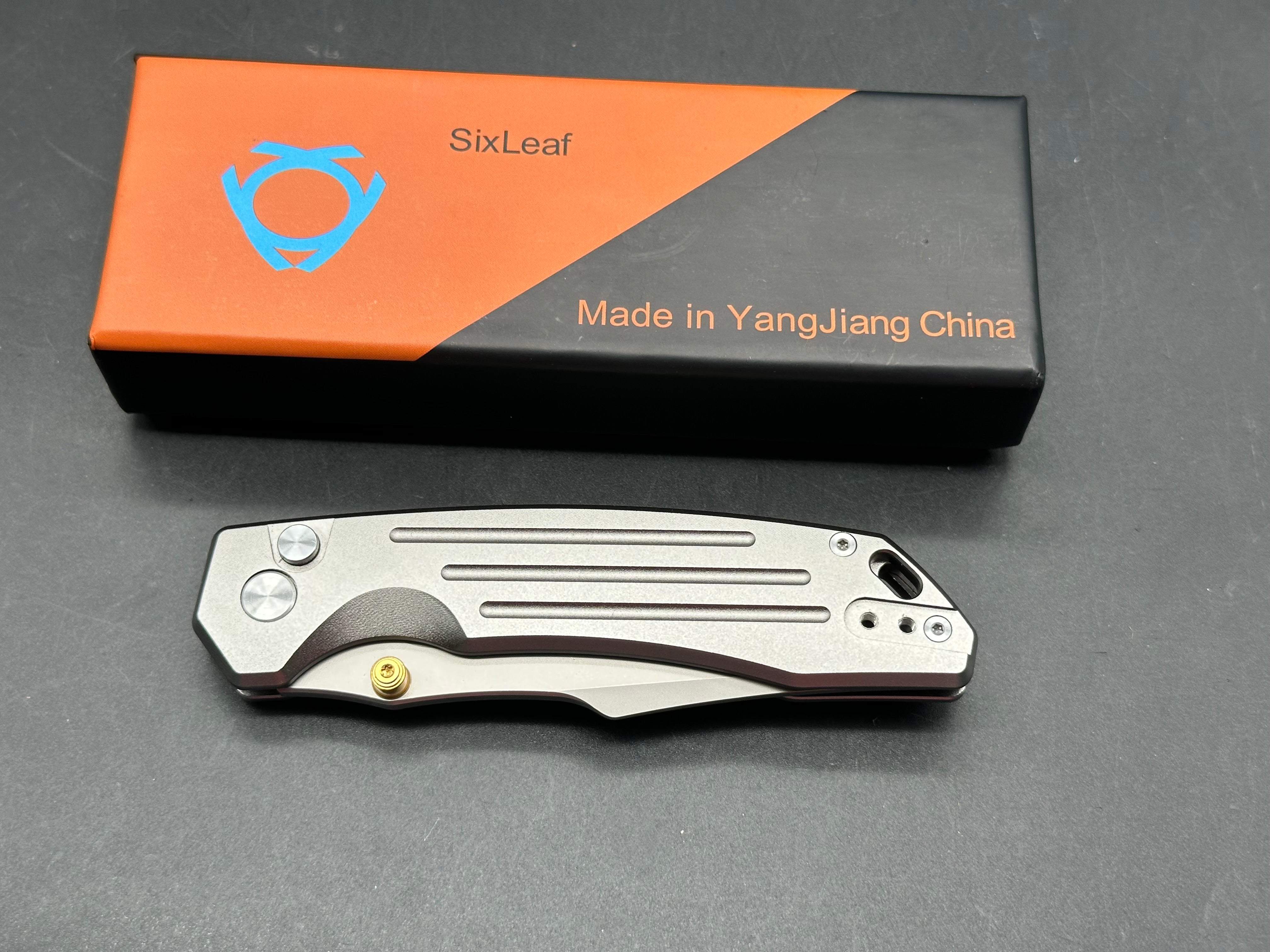Sixleaf SL-82  button lock, aluminum scales, 14c28n blade