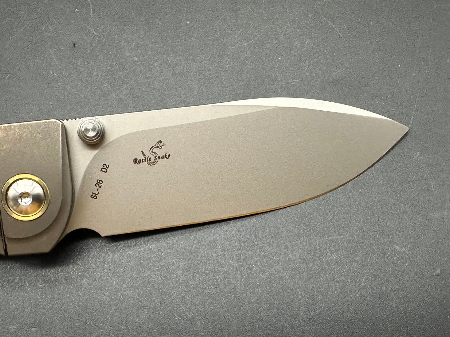 SIXLEAF SL-26-SAND RATTLE SNAKE DESIGN POCKET KNIFE PLAIN EDGE D2 BLADE SANDWASHED TITANIUM HANDLE