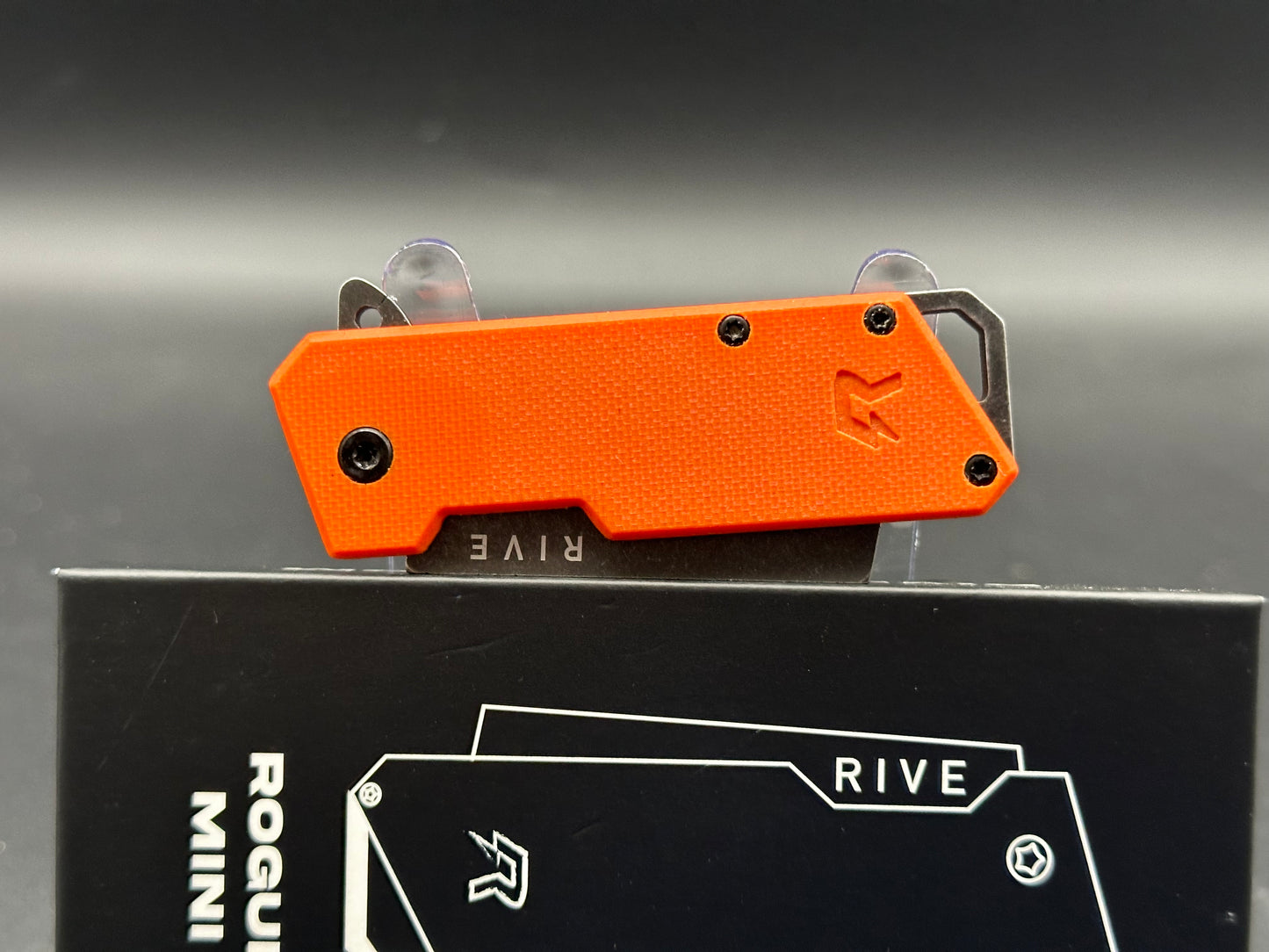 Rive Mini Rogue Fission, 2" AUS-8A Blackwash Blade with Orange G10 Handle