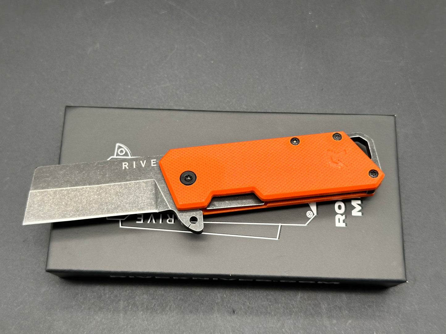 Rive Mini Rogue Fission, 2" AUS-8A Blackwash Blade with Orange G10 Handle