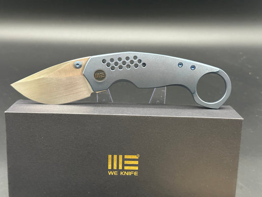 WE ENVISAGE FOLDING KNIFE BLUE TITANIUM HANDLE 20CV DROP POINT