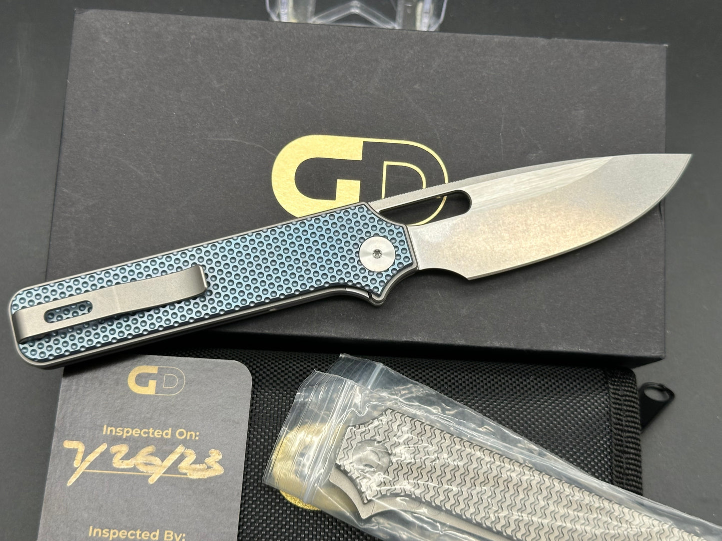 Golden Designworks Standard, 3.25" M390 Blade with Blue Dimple Titanium Handle