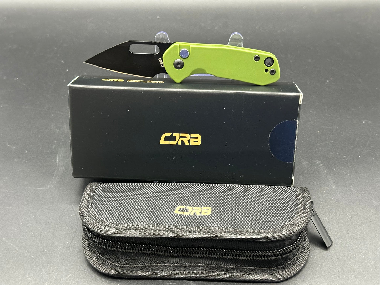 CJRB Mini Pyrite button lock - D2 blade, green handle