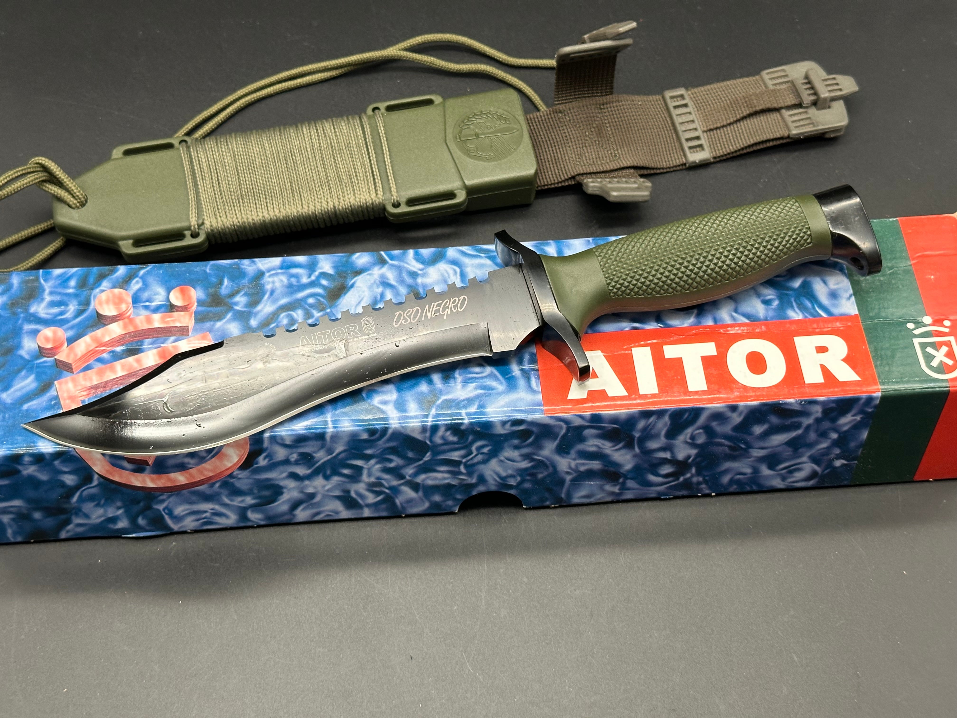 AITOR Oso Negro Fixed 7.25" Black Sawback Blade, OD Green Polymer Handle and Hard Nylon Sheath