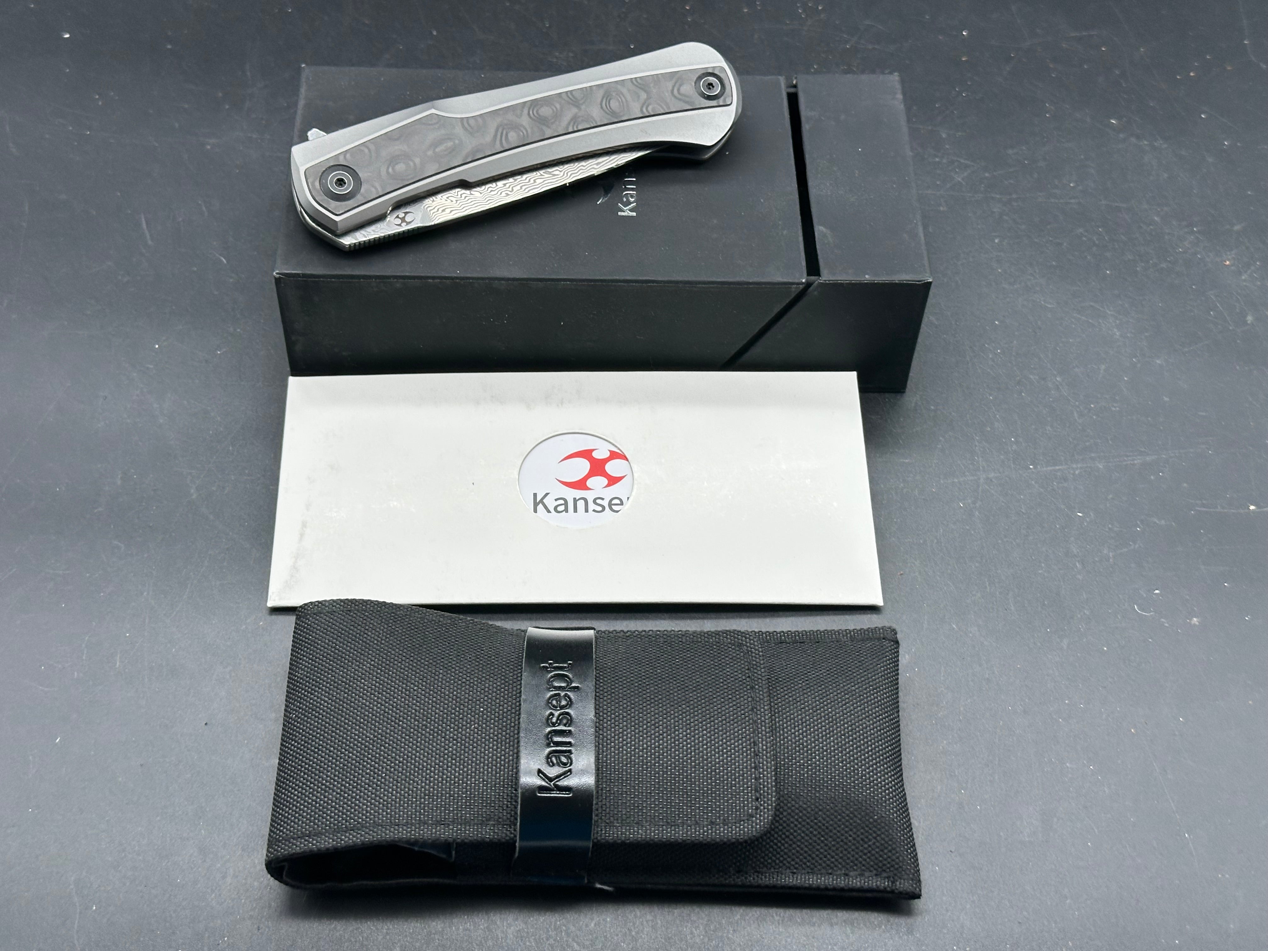 Kansept Kratos titanium handle w Damascus blade