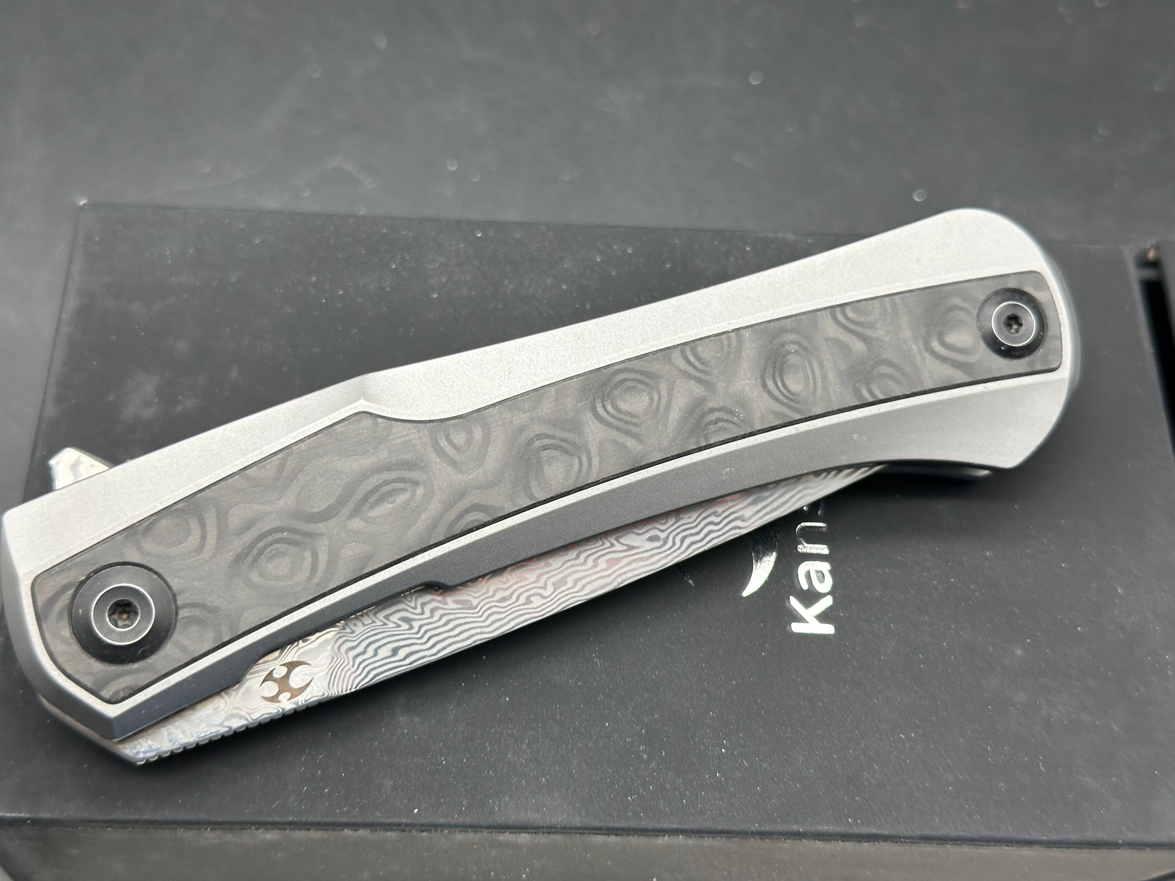 Kansept Kratos titanium handle w Damascus blade