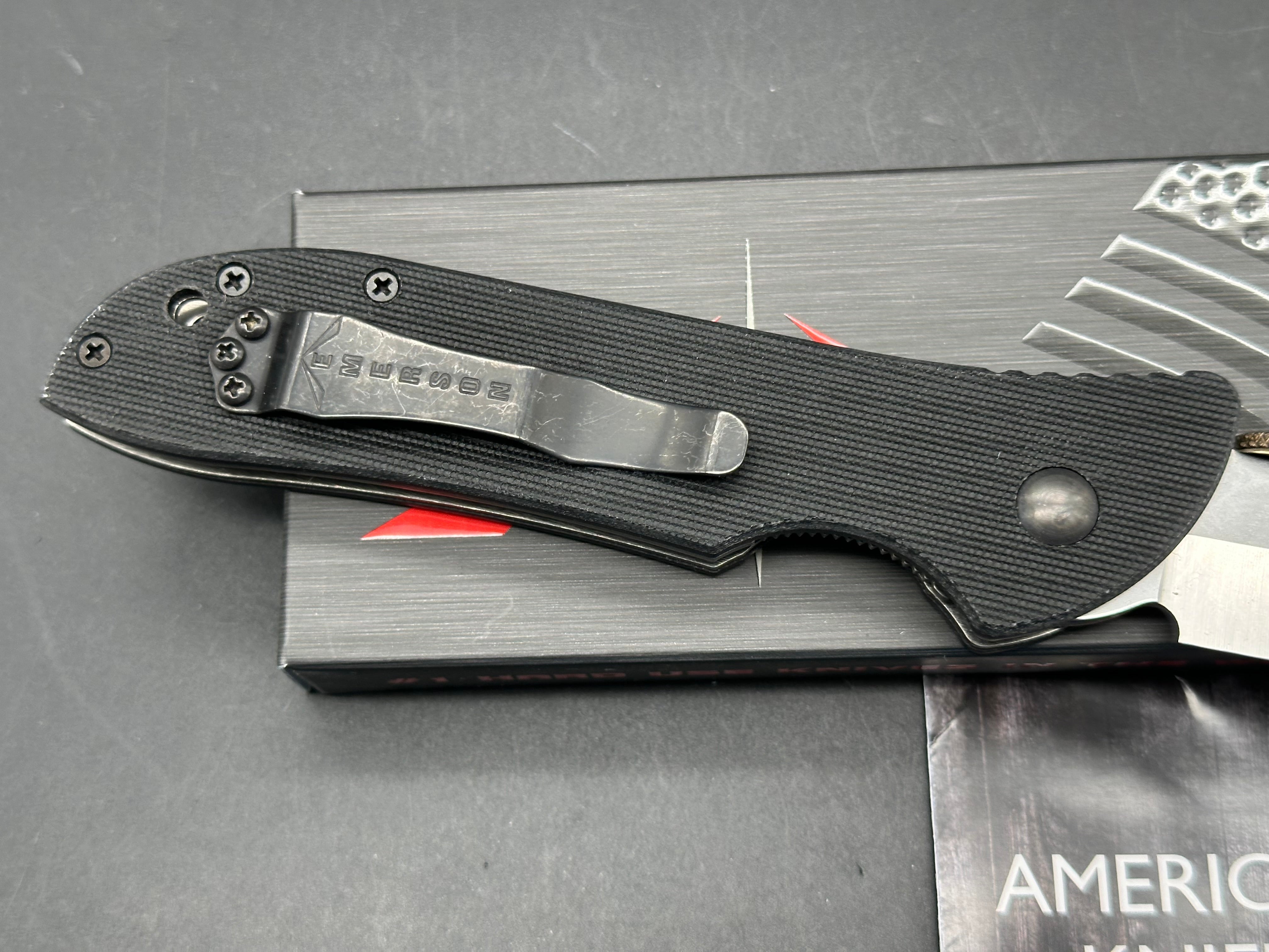 Emerson Waved Super Raven A black G10 handle / 154CM