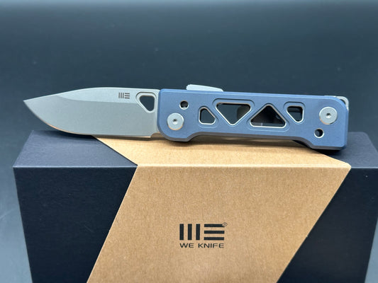 WE TYRO BLUE TITANIUM HANDLE 20CV PLAIN EDGE