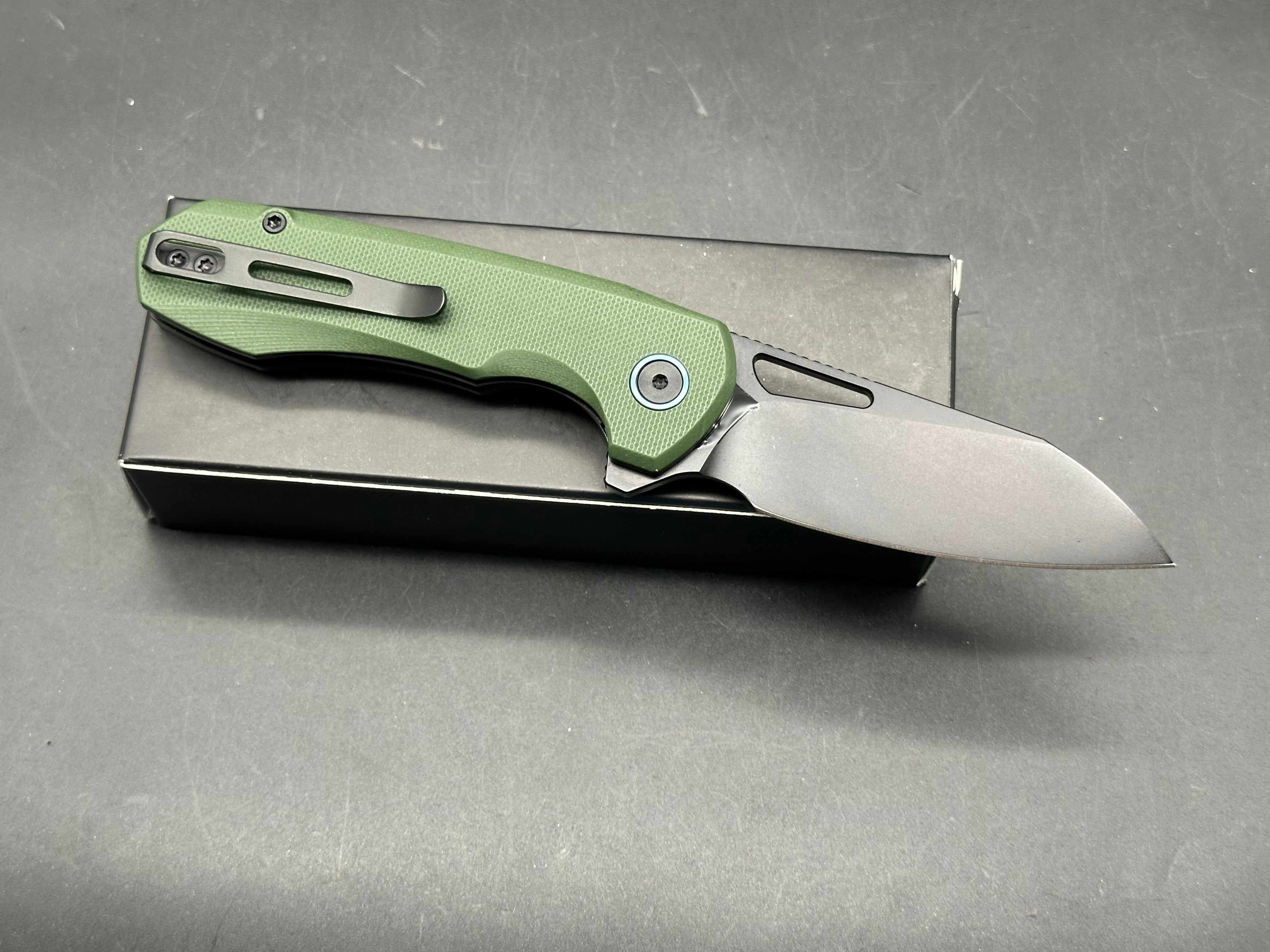 Remette Camel green micarta / D2 top liner lock