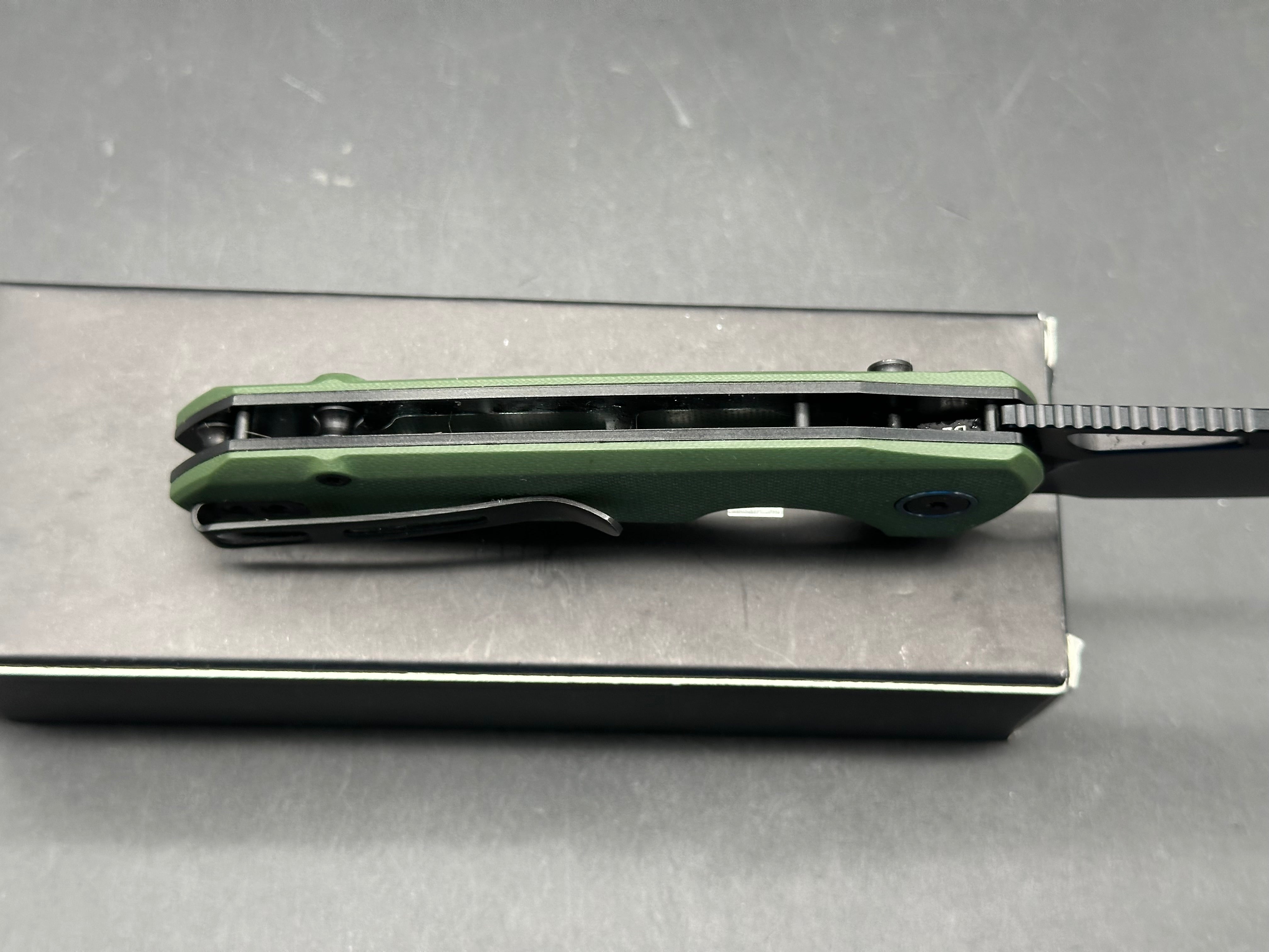 Remette Camel green micarta / D2 top liner lock