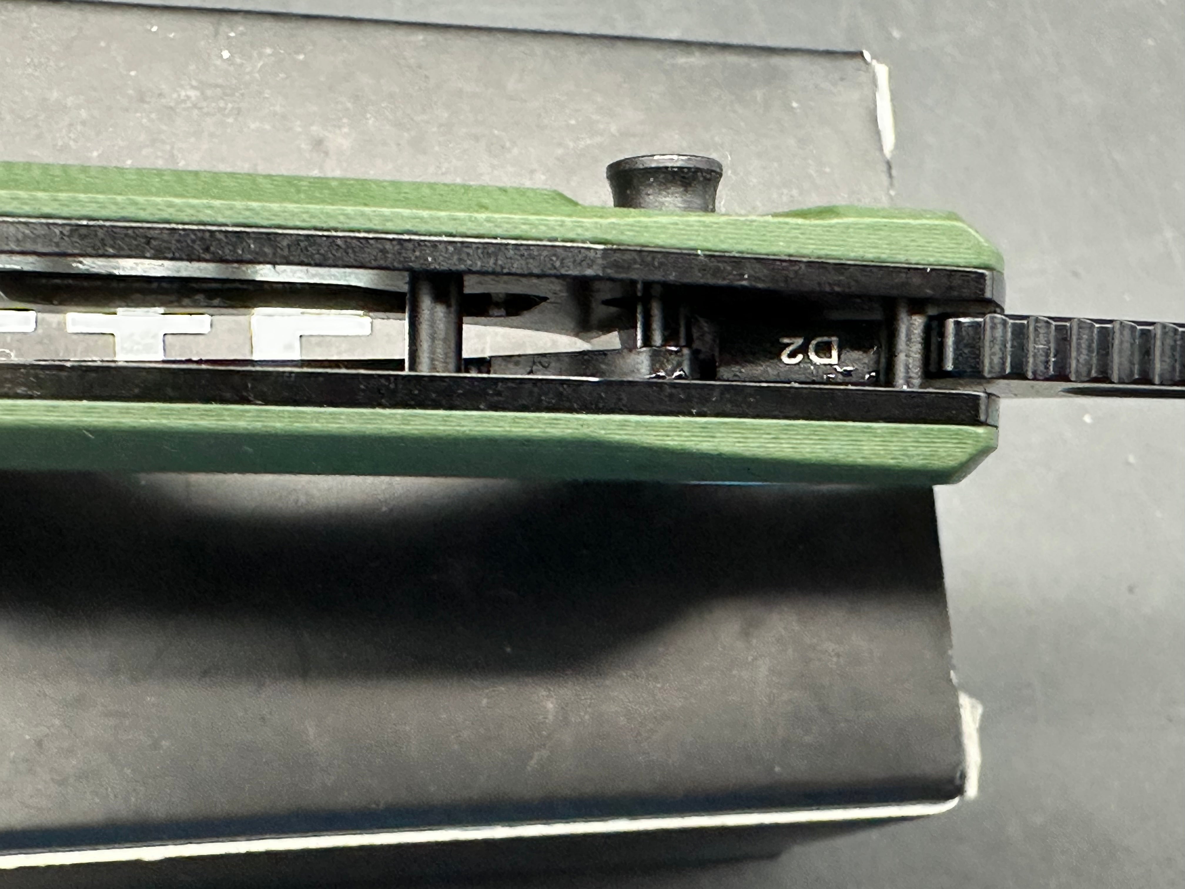 Remette Camel green micarta / D2 top liner lock