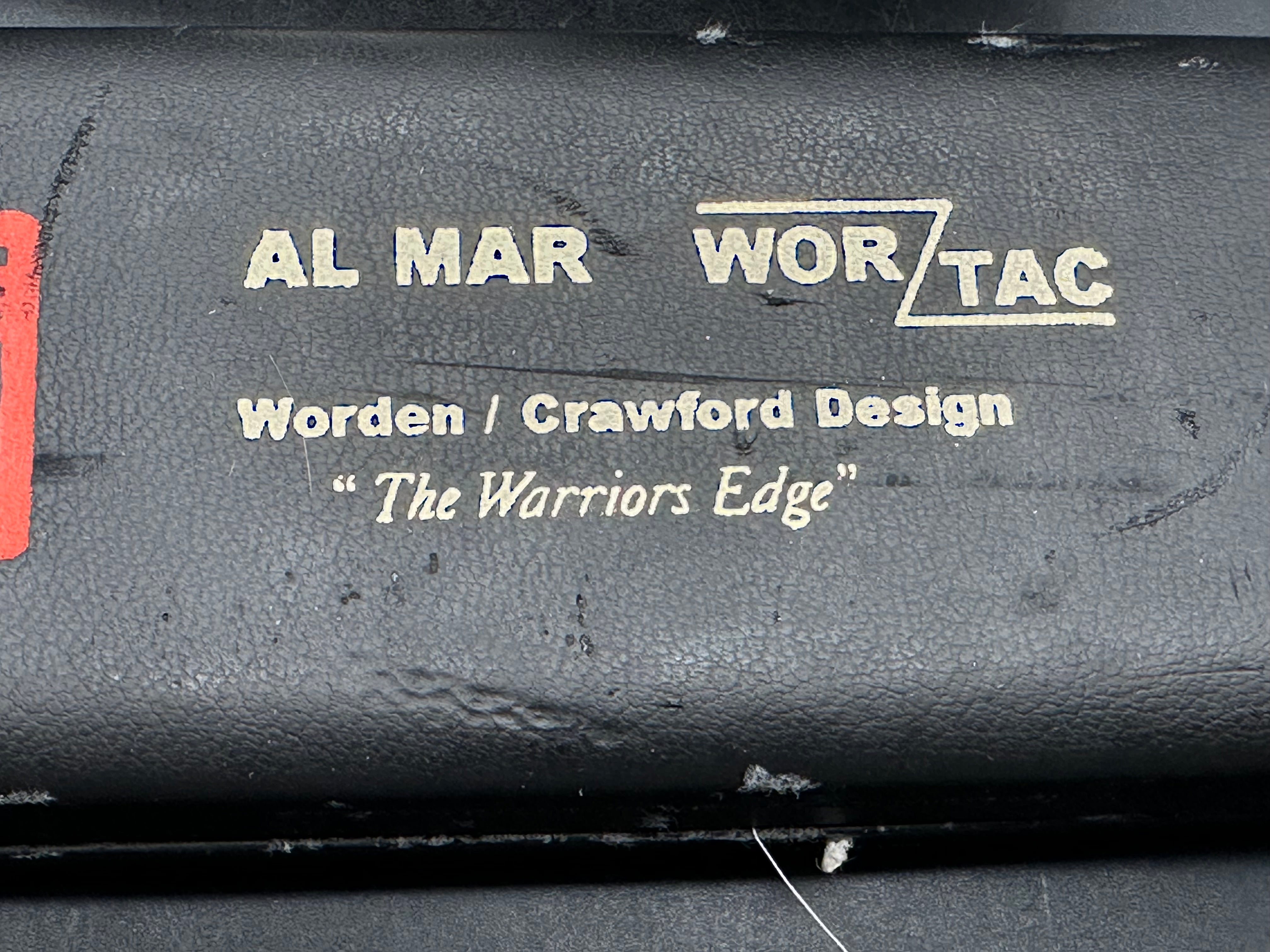 Al Mar Wor-Tac Auto knife was designed by Kelly Wordon and Pat  Crawford