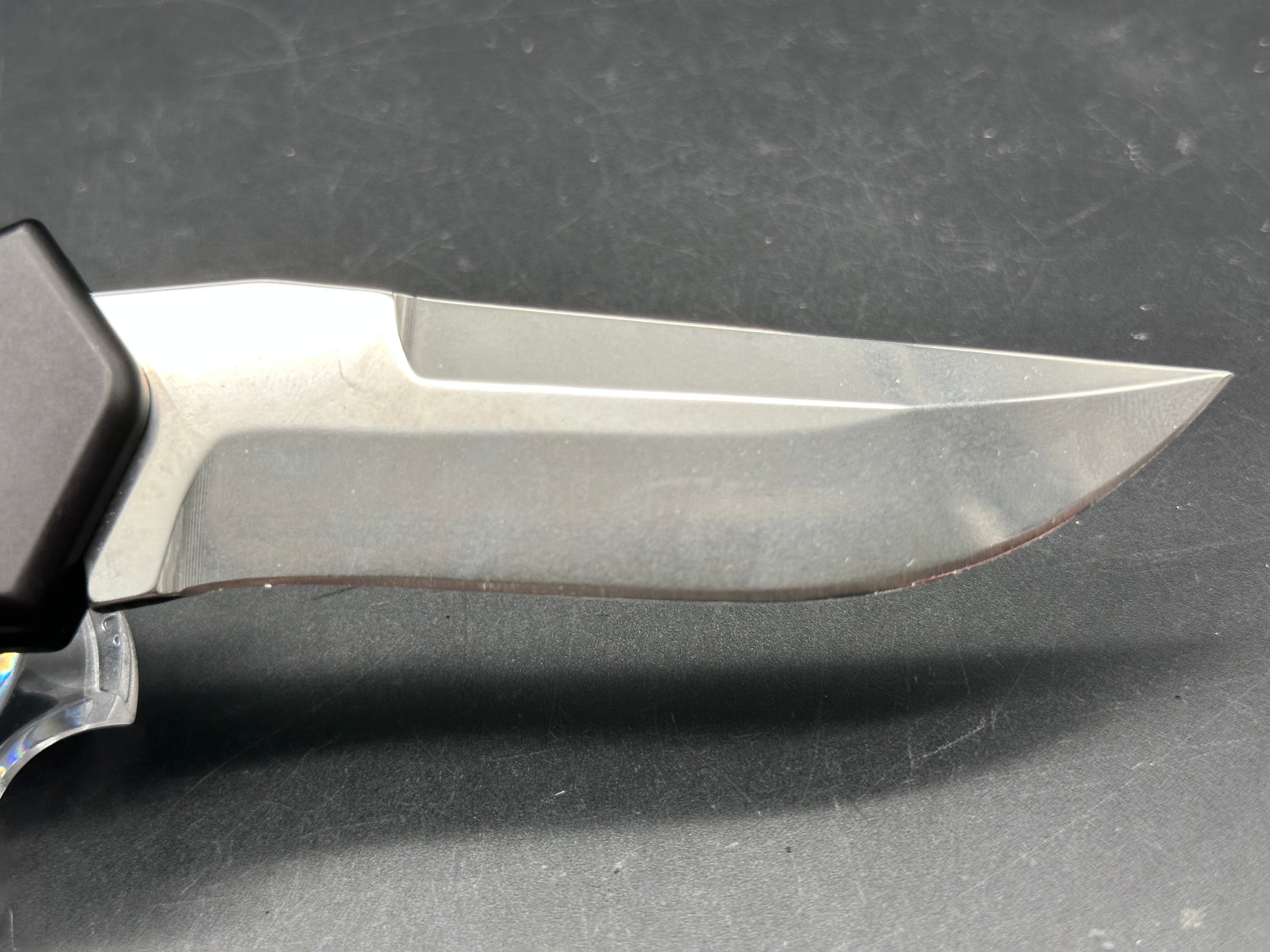 Al Mar Wor-Tac Auto knife was designed by Kelly Wordon and Pat  Crawford