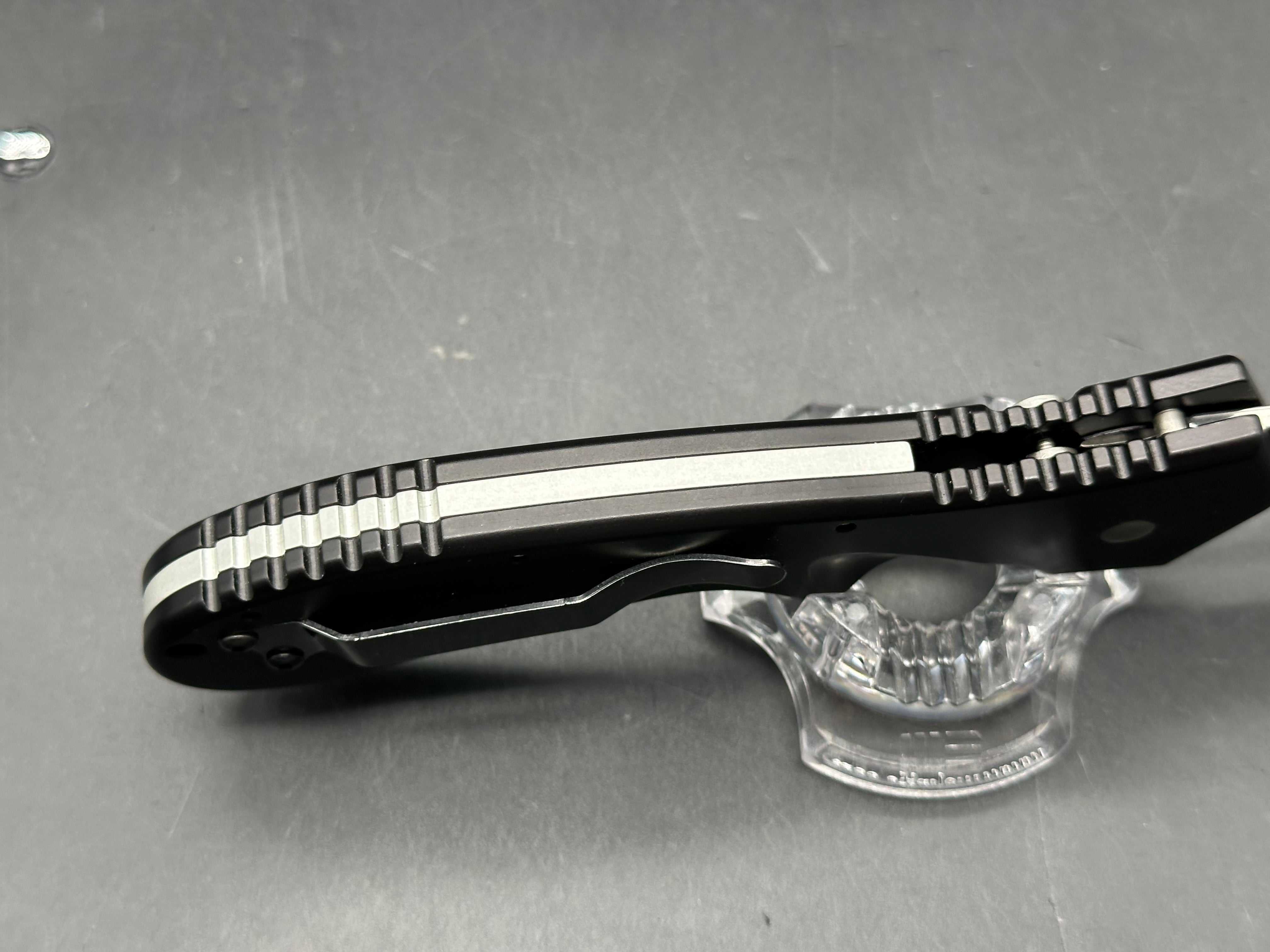 Al Mar Wor-Tac Auto knife was designed by Kelly Wordon and Pat  Crawford