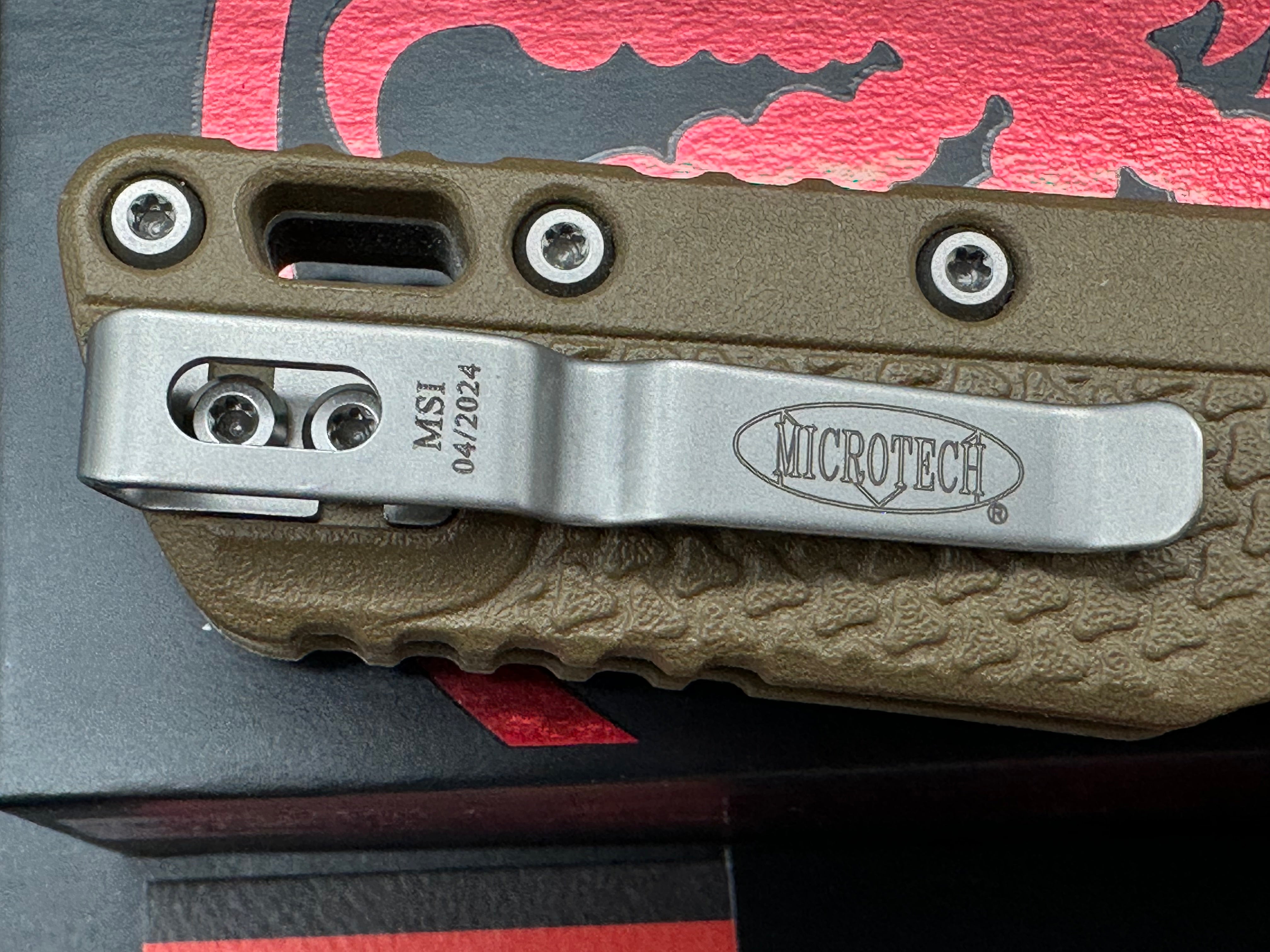 Microtech MSI S/E Ram-Lok Tri Grip polymer dark earth color with stonewash blade