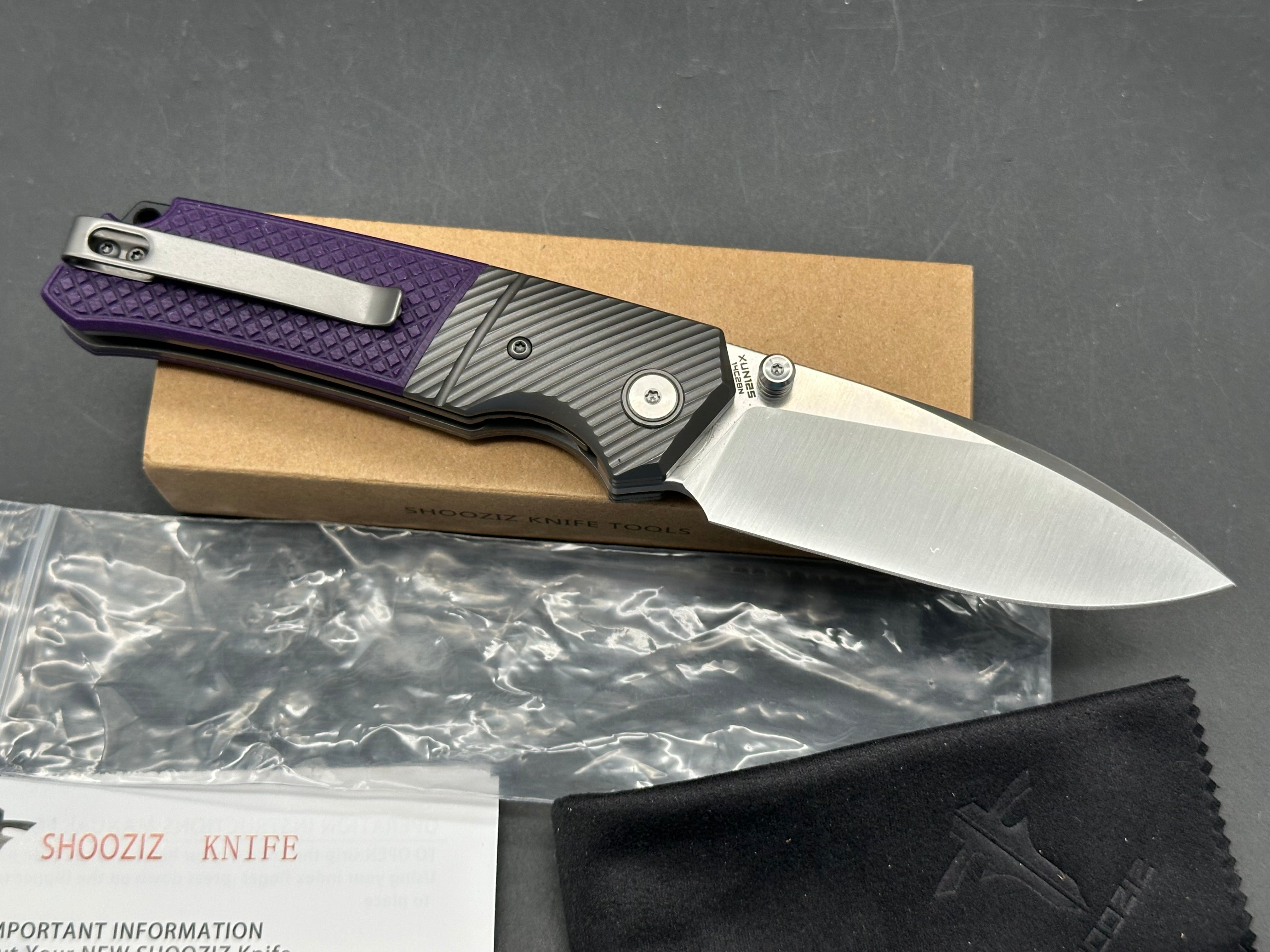 Shooziz XUN 125 folder purple G10 14C28N blade